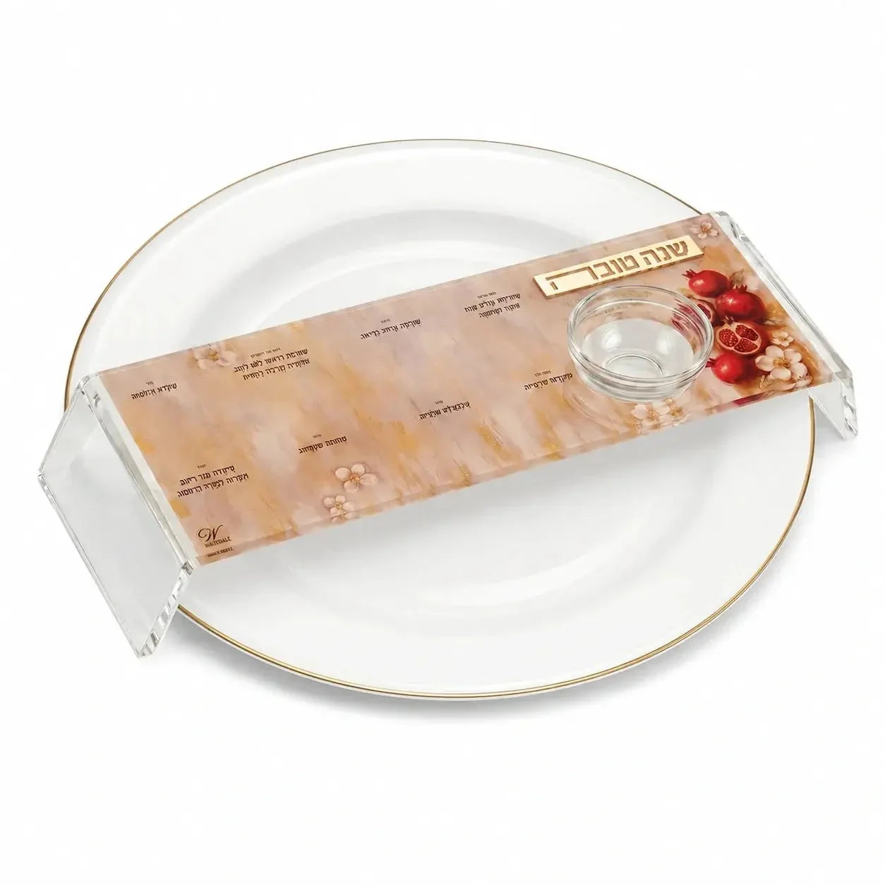 Painted pomegranate Simanim tray resting over a dinner plate (ראש השנה)