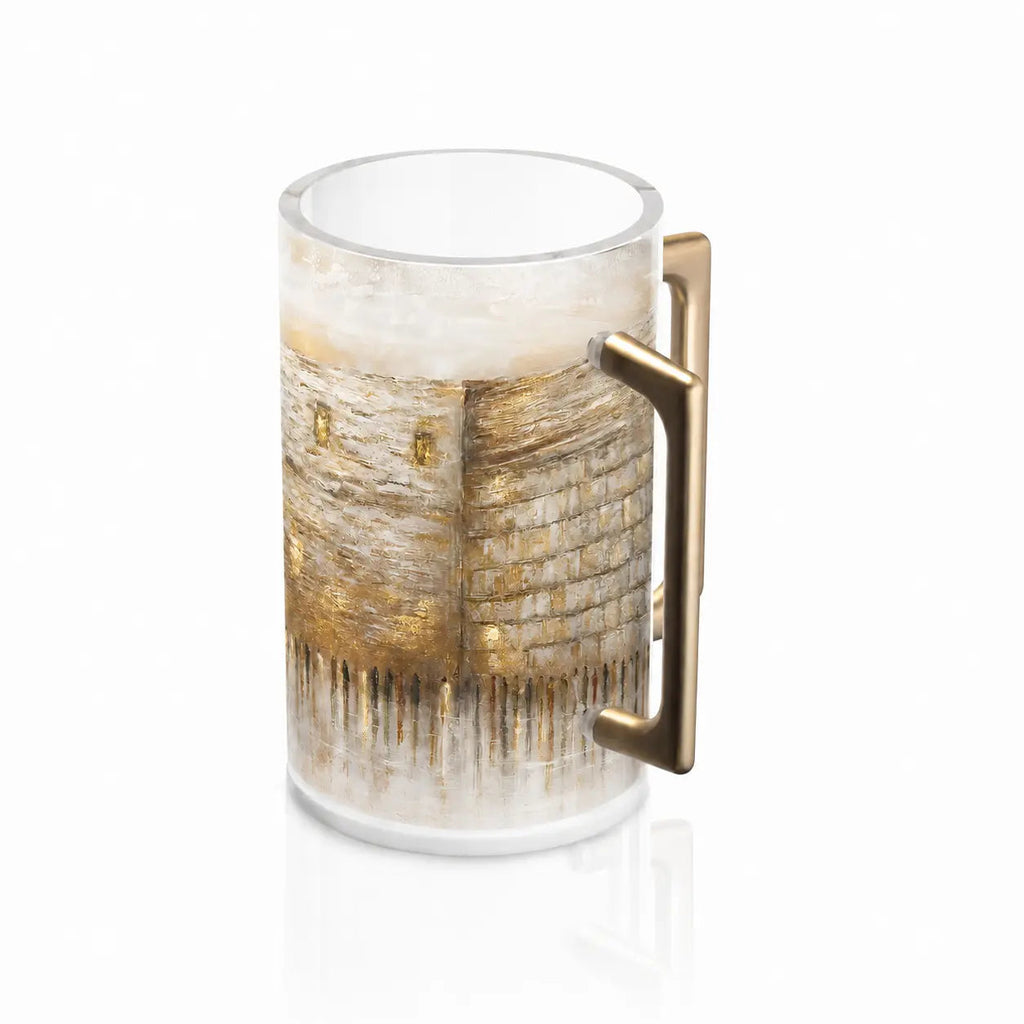 The Taupe Kosel Washing Cup from the Waterdale Collection carries the Kosel around a clear Lucite cup. A brushed gold handle finishes it.