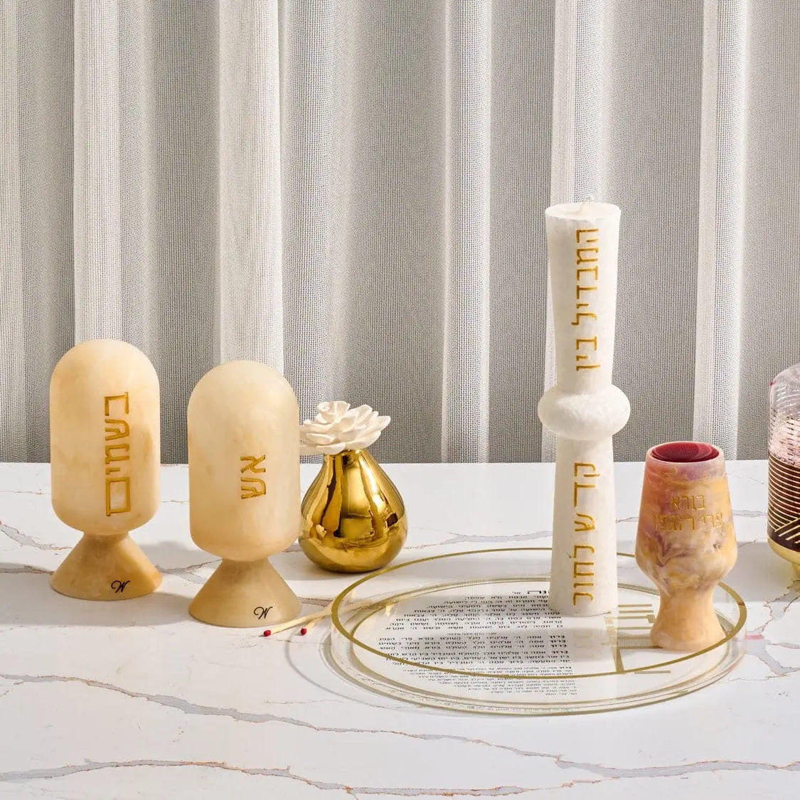 Wooden resin Besamim cloche with metal accents and spice ball, displayed with matching Shabbat judaica accessories on marble surface