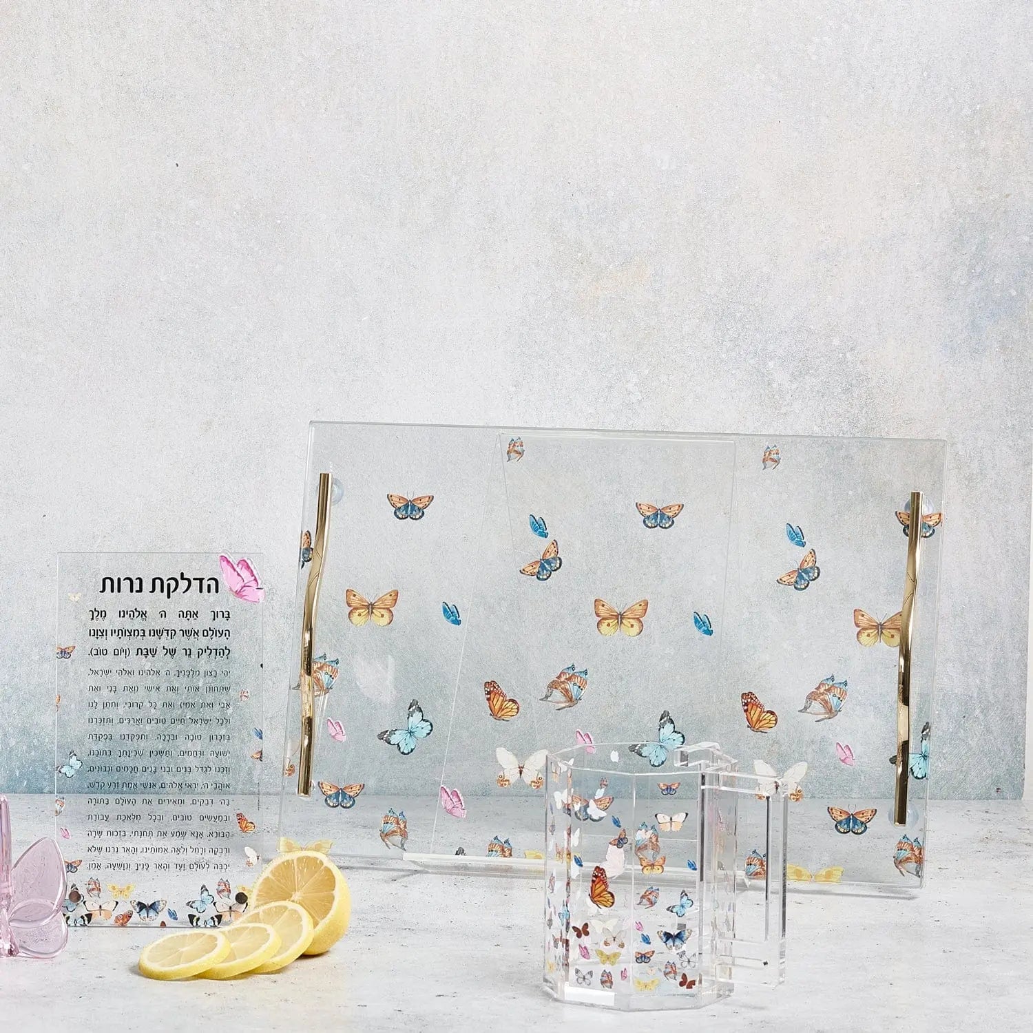 Butterfly Tabletop Hadlokas Neiros plaque with colorful butterfly designs and candle holders for Shabbat candle lighting