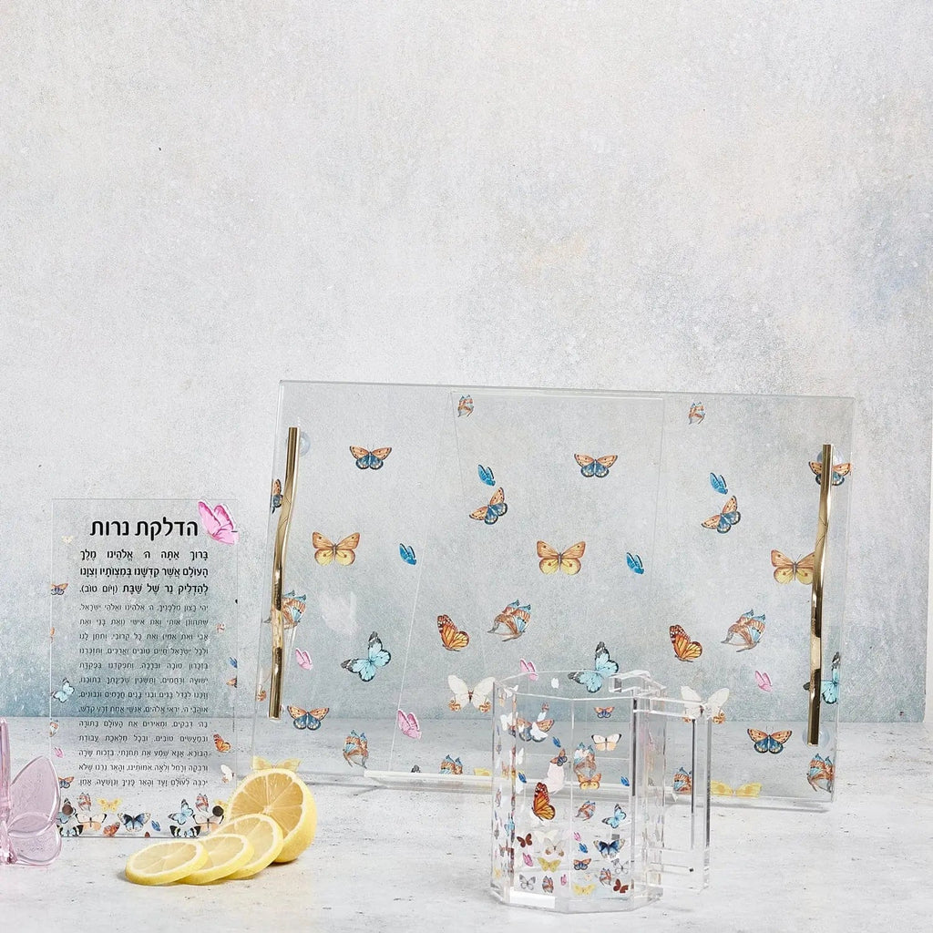 Waterdale Collection butterfly washing cup in soft blue with floral motifs, displayed with coordinating Jewish holiday gift items on white surface.