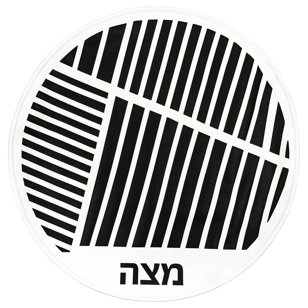 Black leather Diagonal Laser Cut Pesach Set by Waterdale Collection with geometric striped pattern design for holiday table settings.