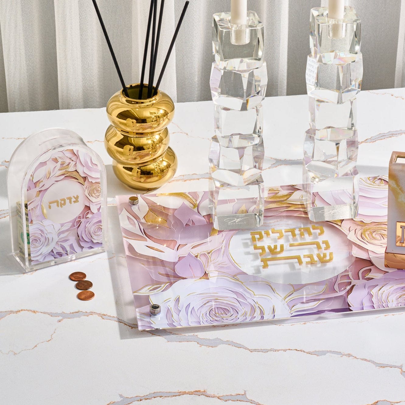 Donut Reed Diffuser in gold finish, modern luxury home fragrance decor, elegant Judaica style accent for living room or Shabbat table setting.