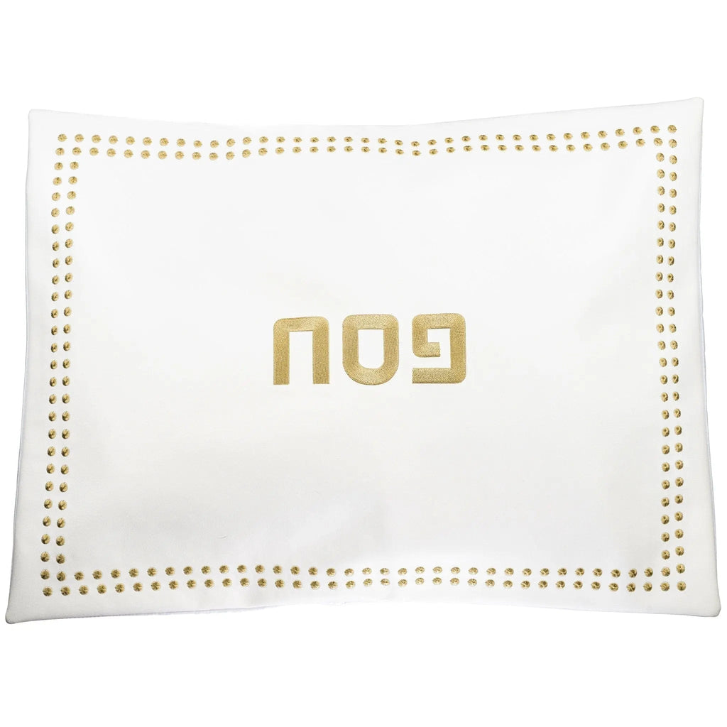 White leather Pesach set with gold dot border and Hebrew text, elegant tabletop design from Waterdale Collection
