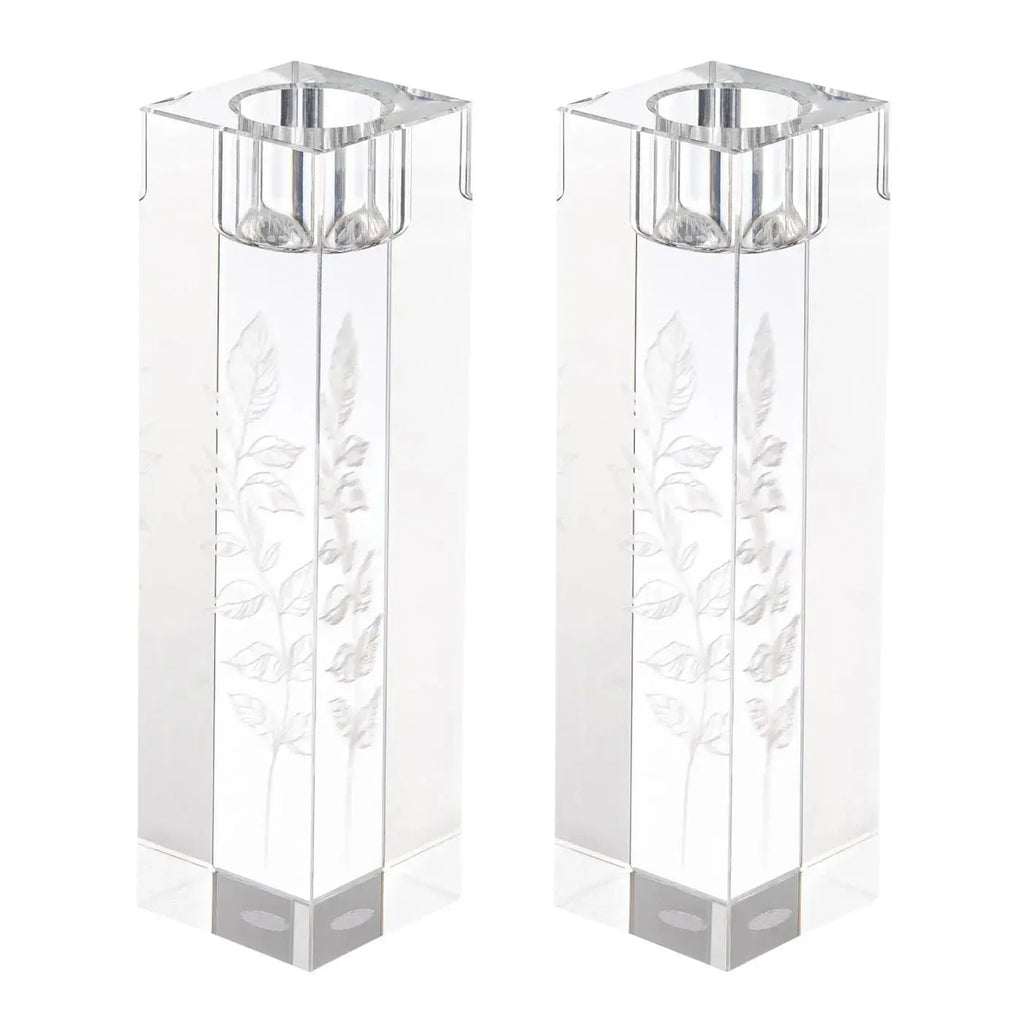 Pair of tall square crystal candlesticks with delicate floral engravings and silver-tone metal tops for Shabbat candle lighting.