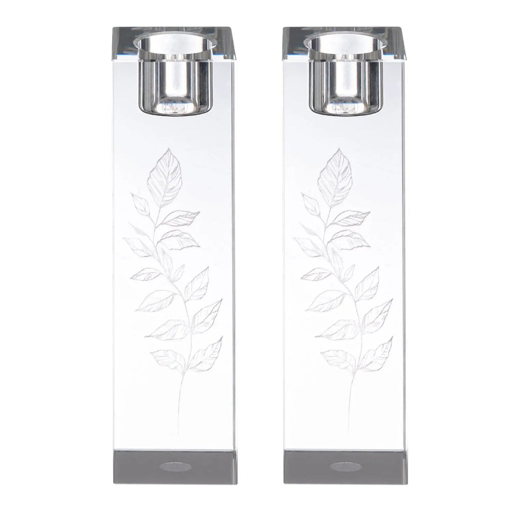 Pair of engraved crystal candlesticks with leaf design and silver-tone metal holders for Shabbat candle lighting.