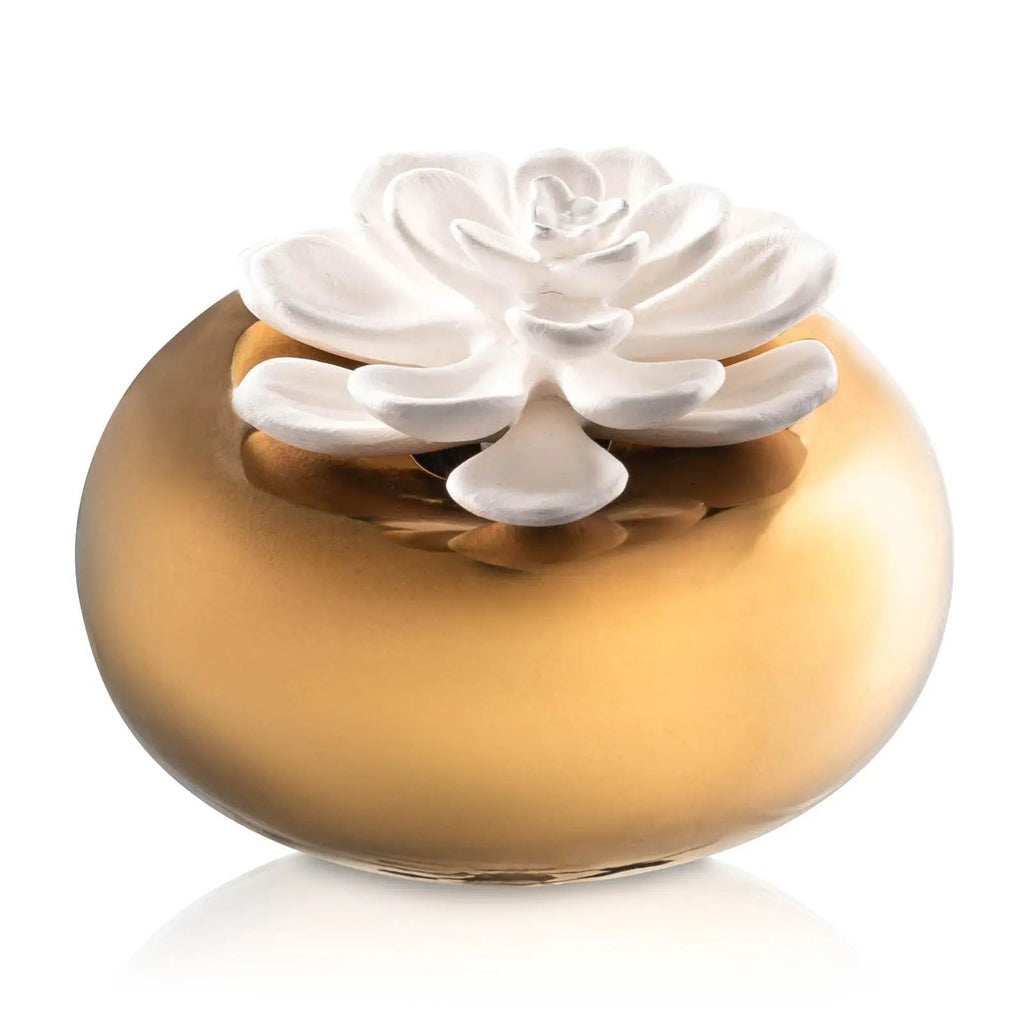 Waterdale Collection gold bowl diffuser topped with white ceramic flower petals, scent disperser for home fragrance