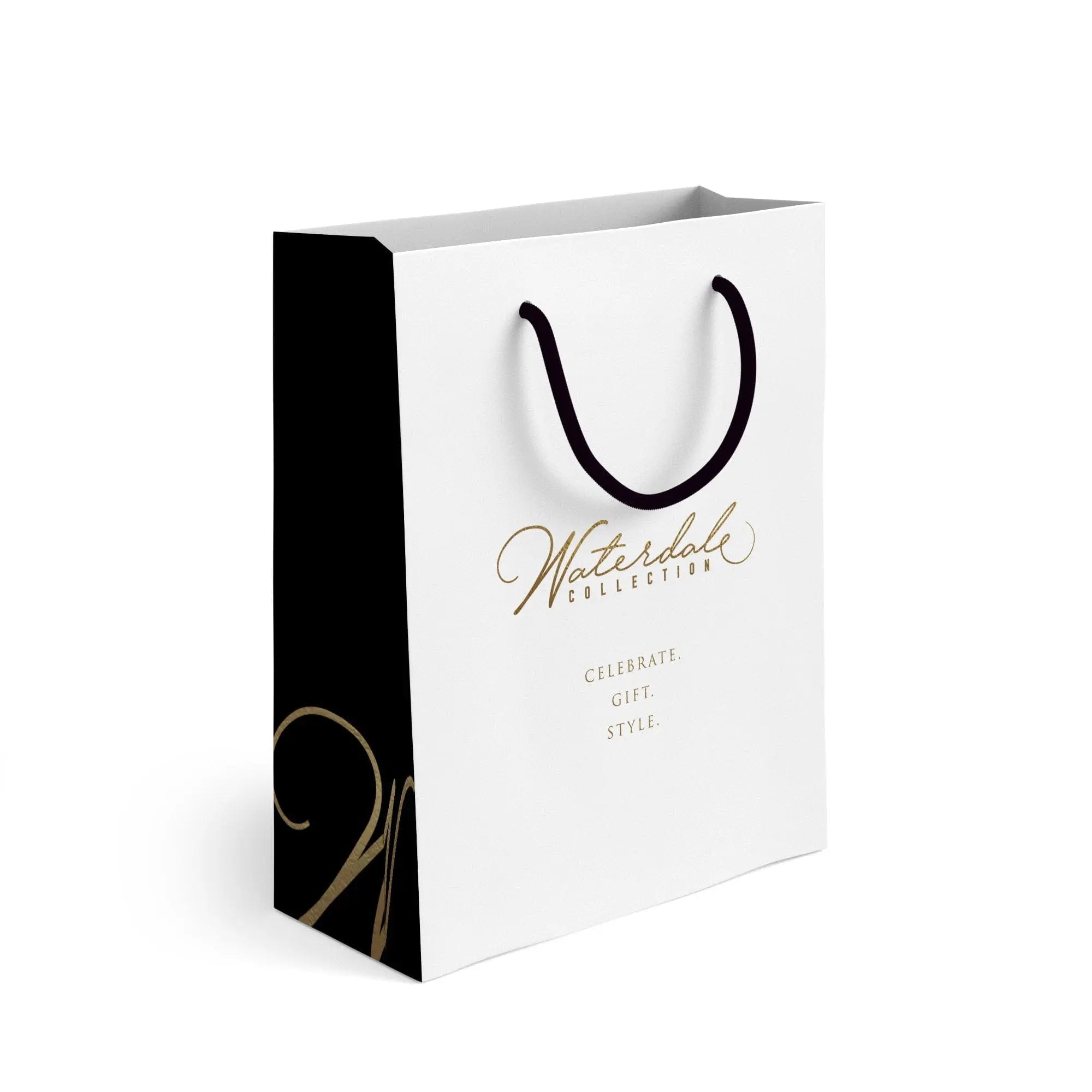 White and black Waterdale Collection gift bag with handles and elegant script branding detail, perfect for presents.