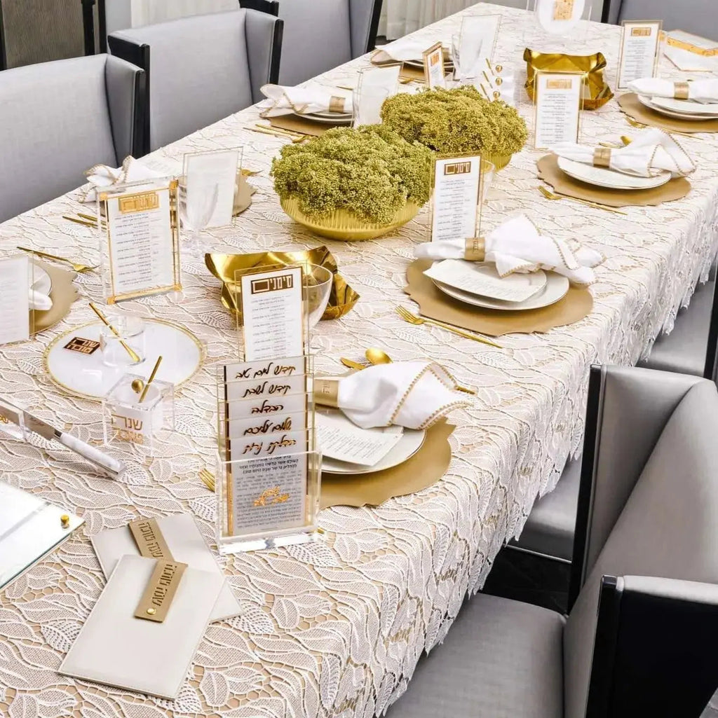 Greenery Gold Flower Pot with faux green foliage on elegant table setting with gold-trimmed place settings and cream runner.