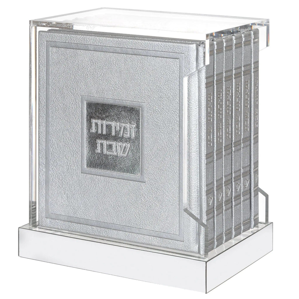 Hardcover leather bencher set with lucite sides and silver accents, featuring Hebrew text on front cover displayed on white base.
