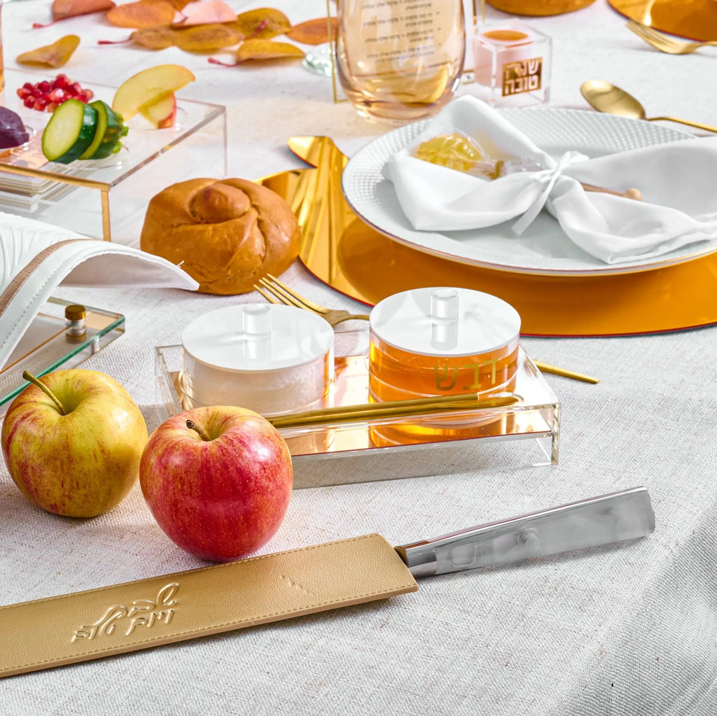 Waterdale Collection honey salt dish in cream ceramic displayed on a holiday table setting with fresh apples and serving pieces.