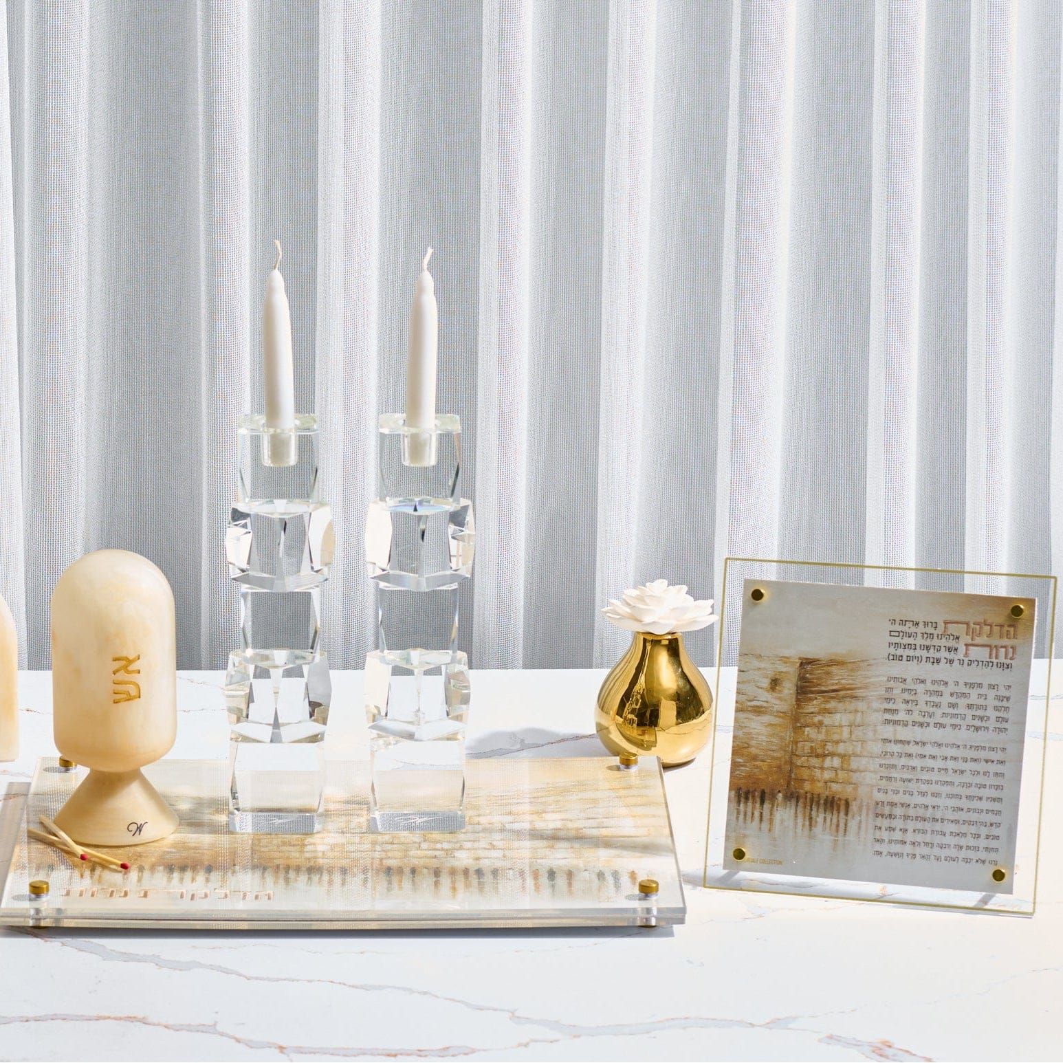 Jerusalem Taupe Hadlokas Neiros acrylic tabletop prayer display styled with Shabbat candlesticks – Waterdale Collection