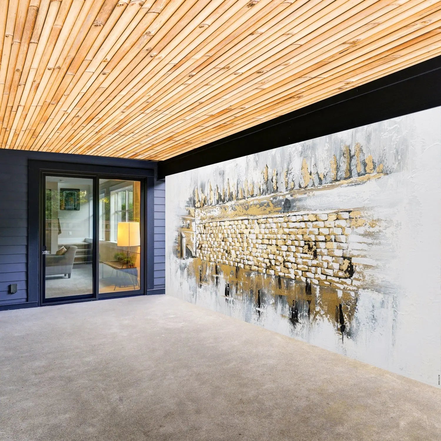 Kosel at Winter vinyl sukkah decoration featuring a golden cityscape design on white background, displayed on sukkah wall with wooden ceiling visible.