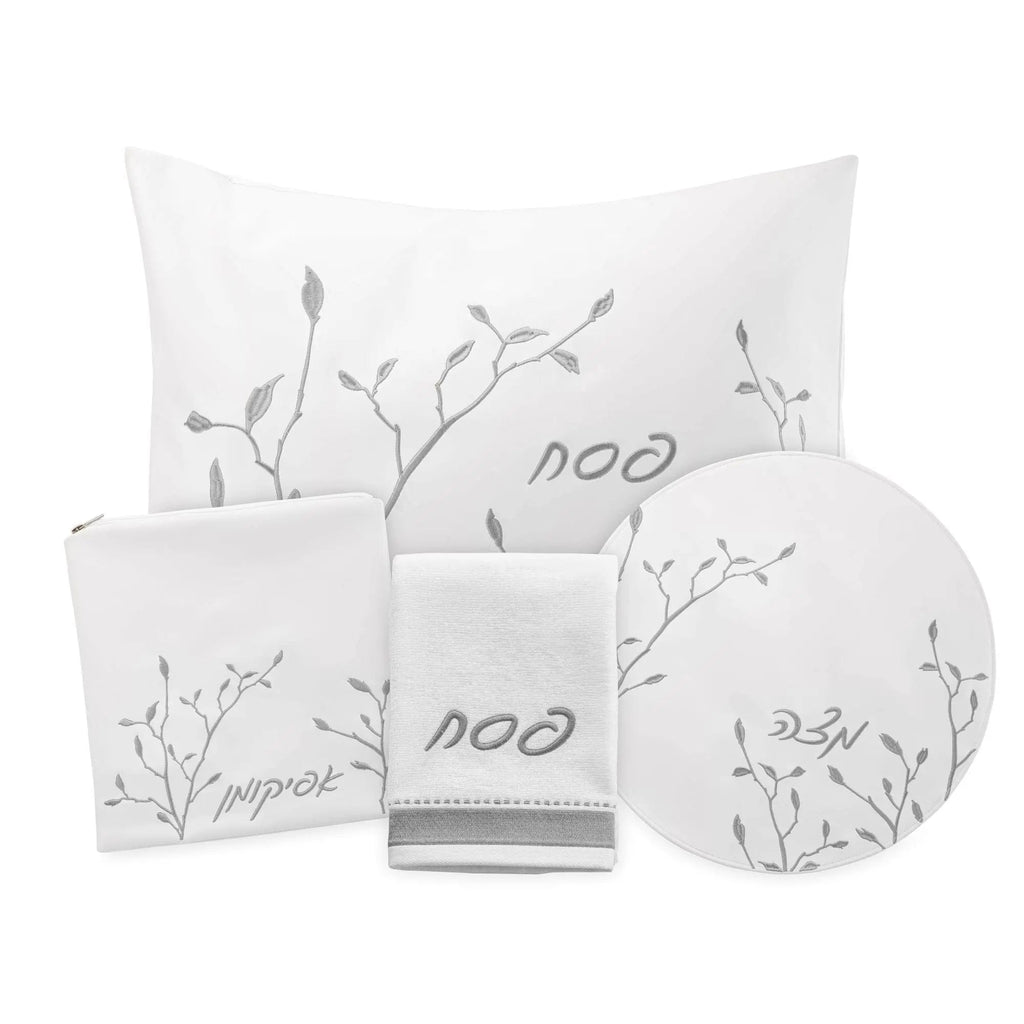 Waterdale Collection Leaf Pesach Set featuring white and silver dishware with botanical leaf designs and leather accents for holiday table.