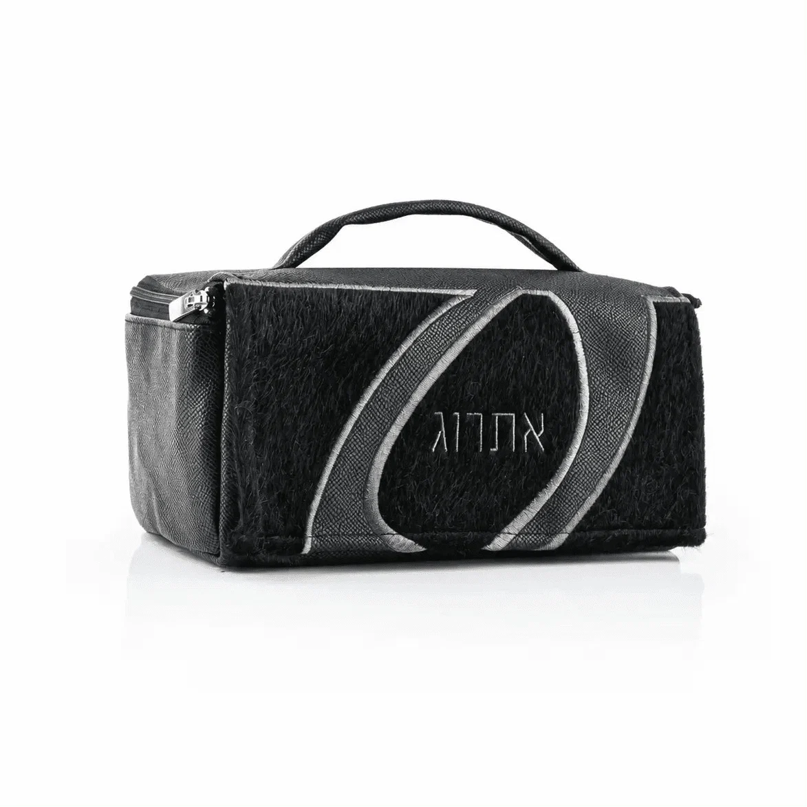 Black fur etrog bag from Waterdale Collection with a gray leather loop and embossed Hebrew lettering.