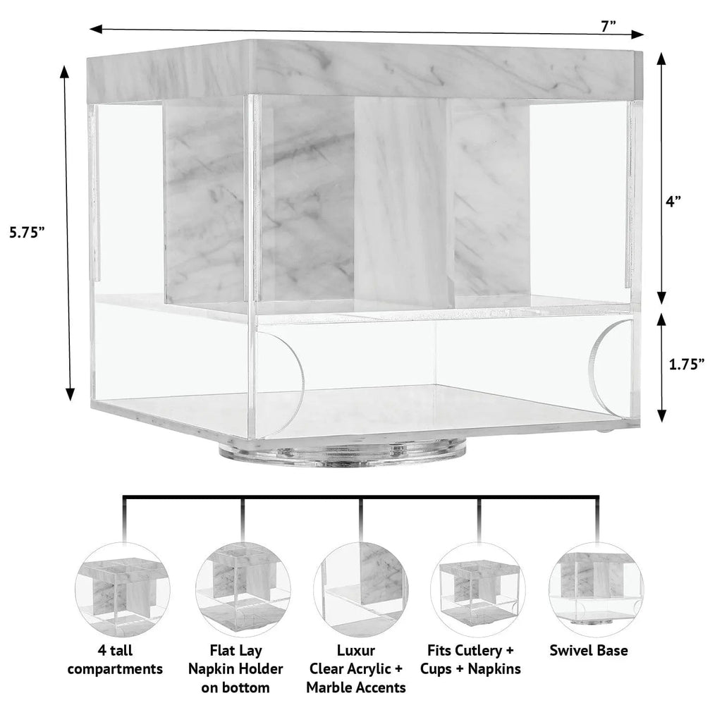 Marble swivel silverware caddy with compartments for utensils and napkins, featuring a white marble base and clear acrylic top.