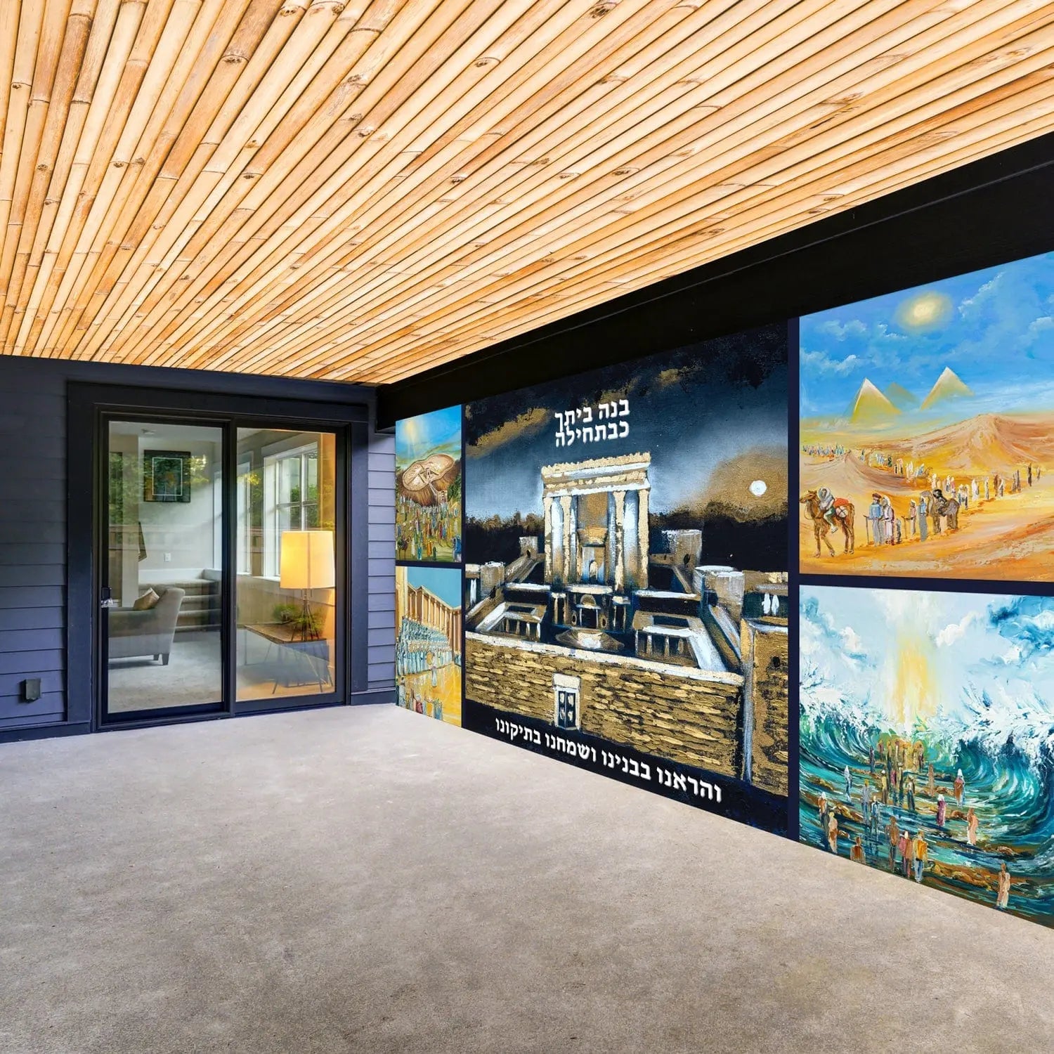 Navy collage vinyl sukkah mural displayed on wall, featuring painted judaica artwork in modern sukkah decoration setting with natural lighting.