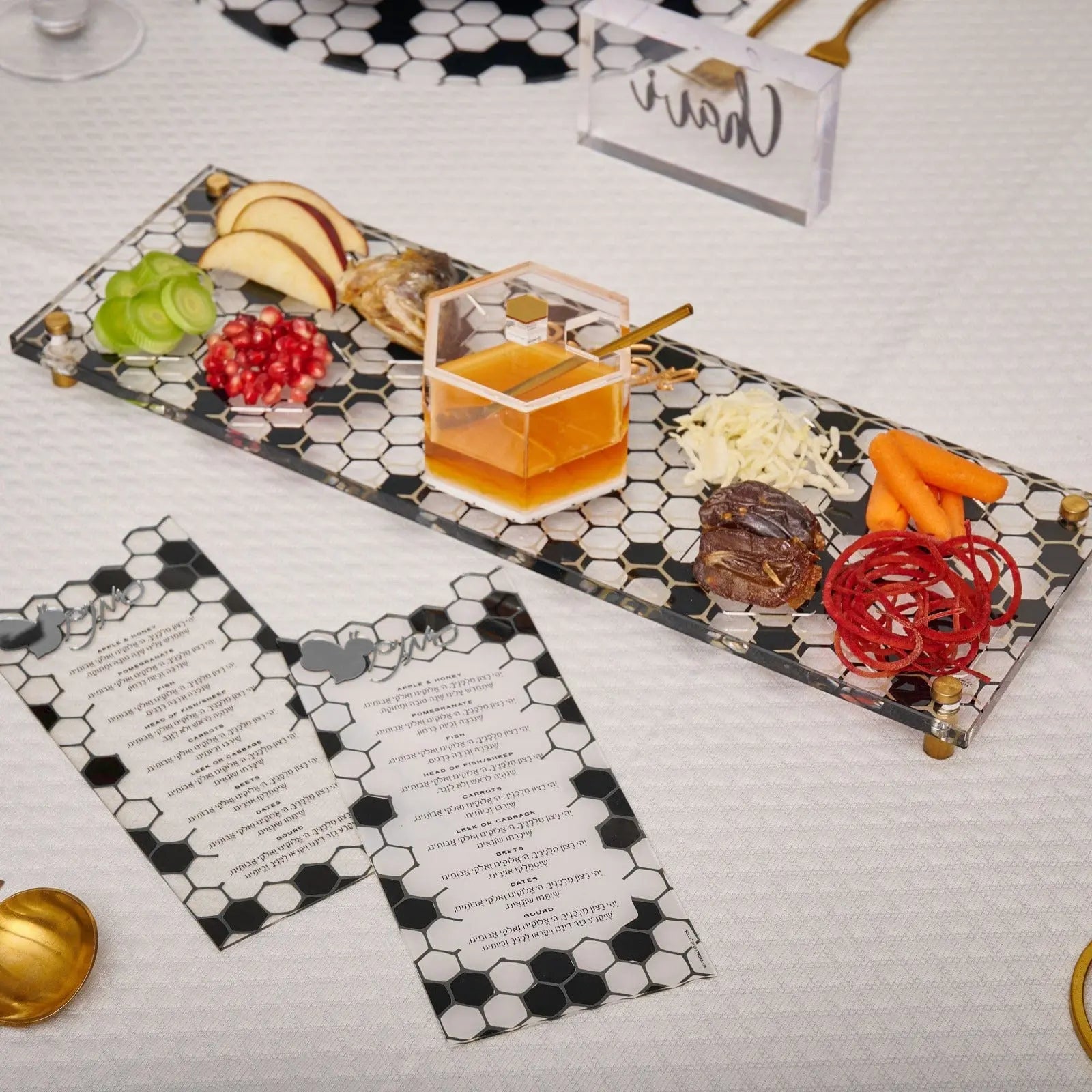 Onyx Simanim Tray With Cards featuring black and white patterned ceramic design with small glass bowls for Passover Seder arrangement and included instruction cards.