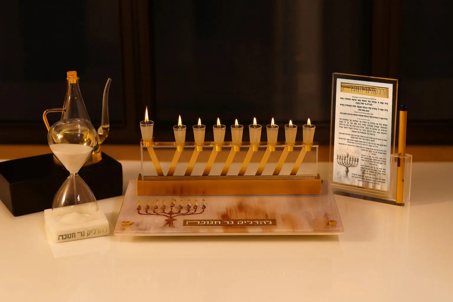 Painted by Batya 2.0 menorah tray in wood with hand-painted details, displayed with candles and Chanukah prayer card.
