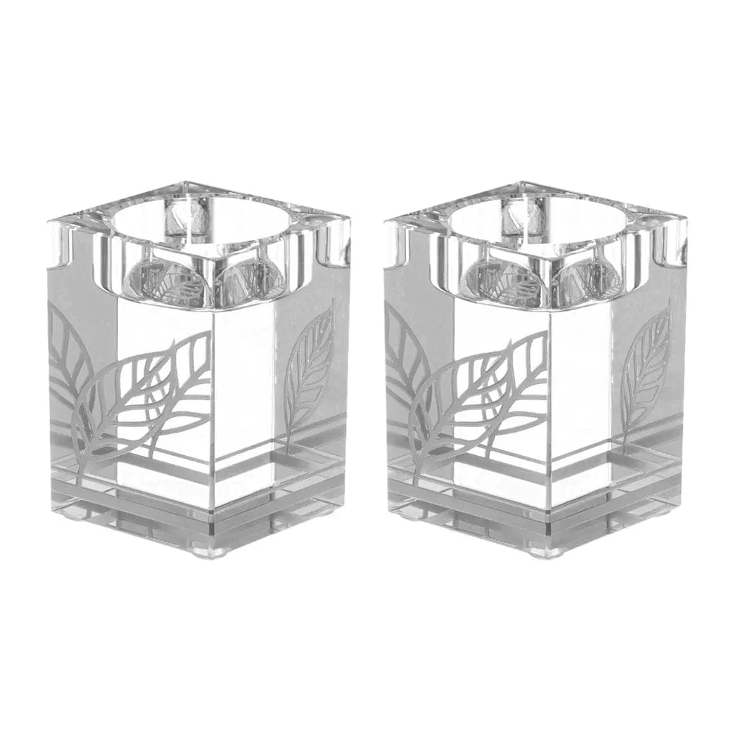 Pair of clear crystal painted tea light holders with geometric frosted designs, perfect for Shabbat candle lighting ceremonies.