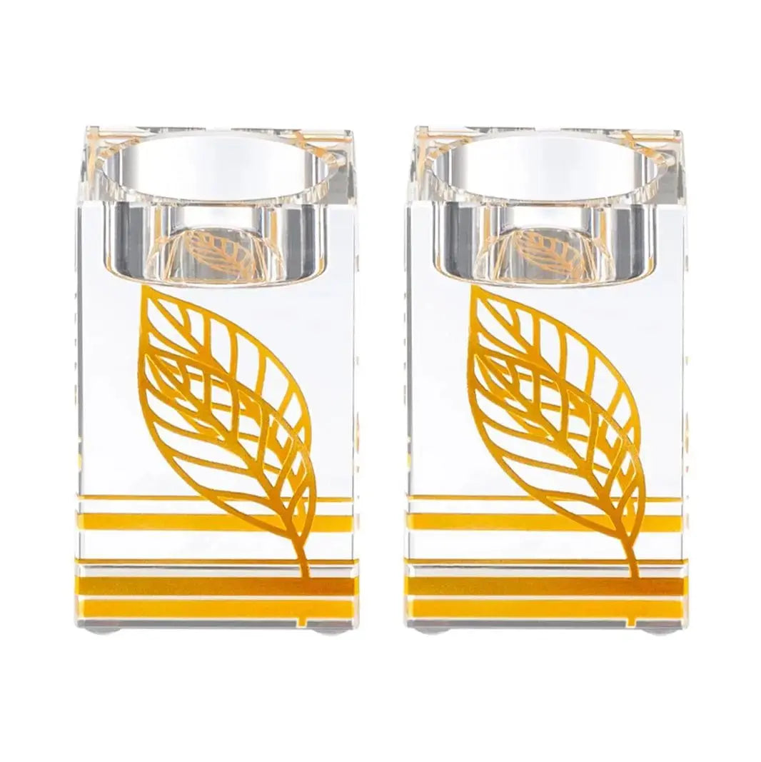 Pair of crystal tea light holders with hand-painted golden leaf design and horizontal gold stripes, Waterdale Collection Shabbat candle holders.