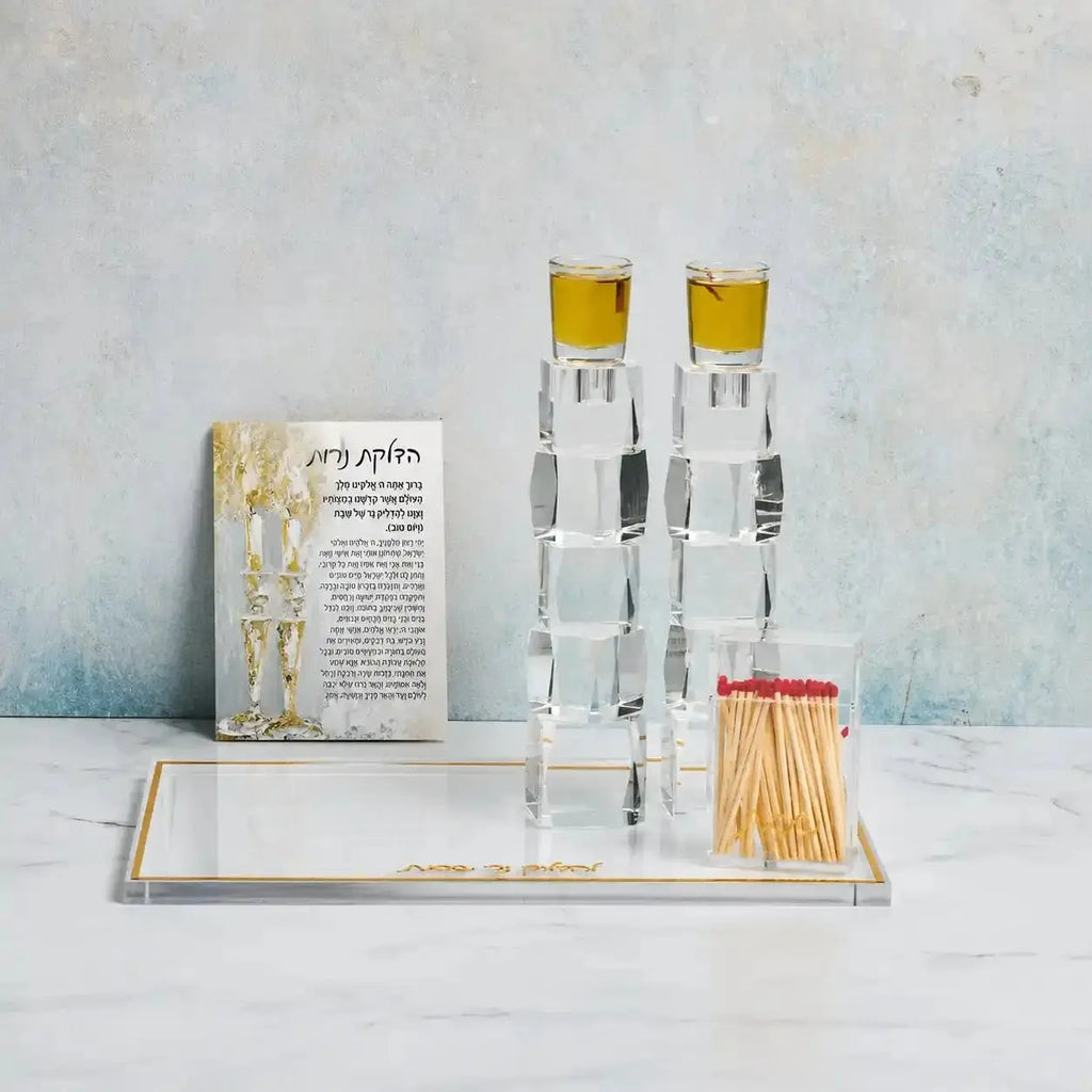 Painted Gold Candles Tabletop Hadlokas Neiros plaque with two white candle holders featuring gold-painted tops, displayed on white wooden base with prayer card.
