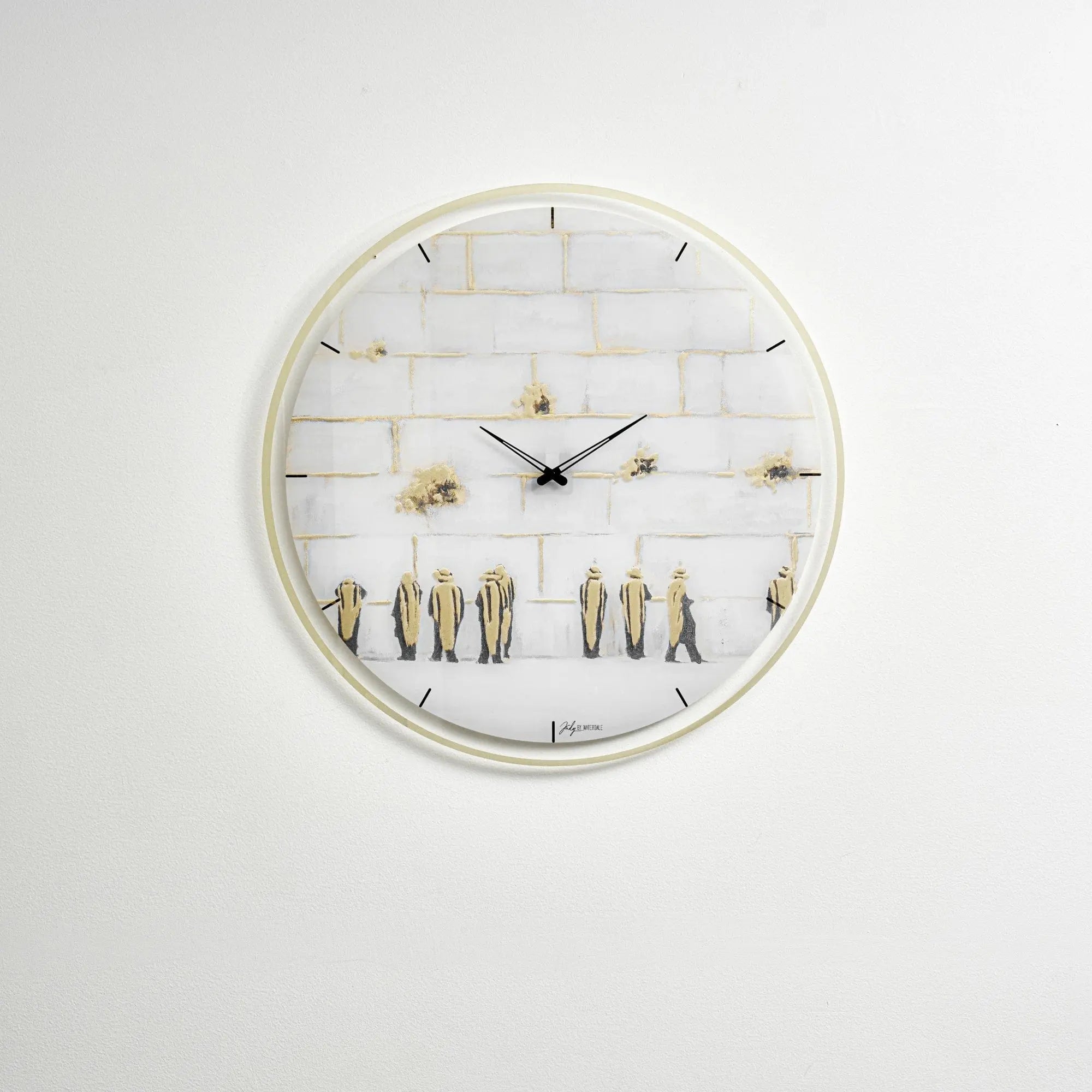 Painted Kosel wall clock with white face, gold-toned numerals and hands, featuring decorative elements on a light background.