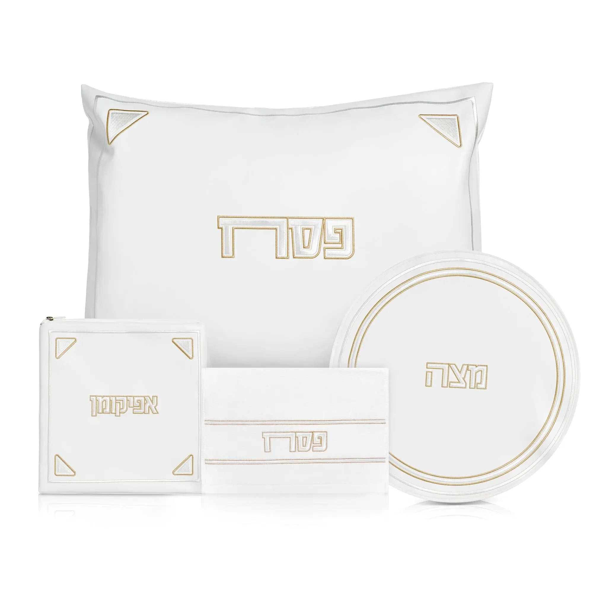 Pearlstone Pesach set with white leather items and gold accents, including pillow, placemat, plate, and napkin holder for holiday table settings.