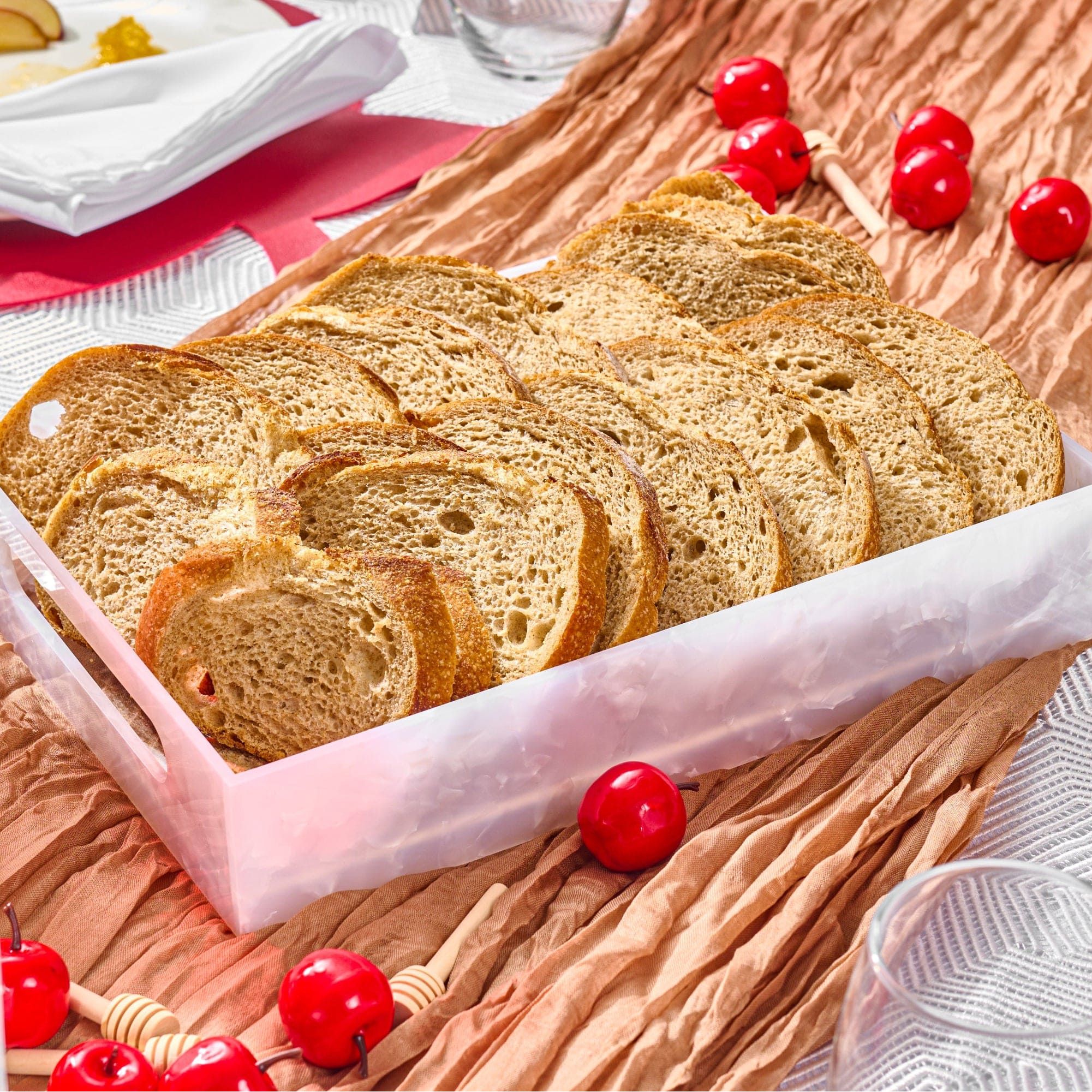 Pearlstone Serving Tray holding sliced challah bread on an elegant holiday table