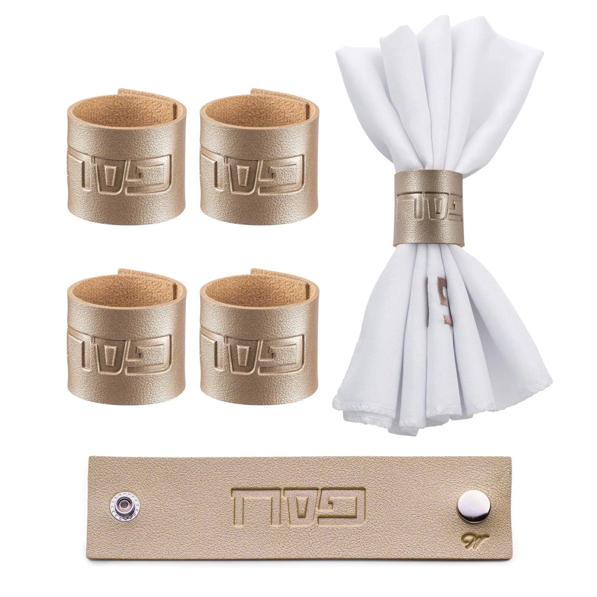Four gold leather Pesach napkin rings displayed with a white fanned napkin and gold bar, perfect for holiday table settings.