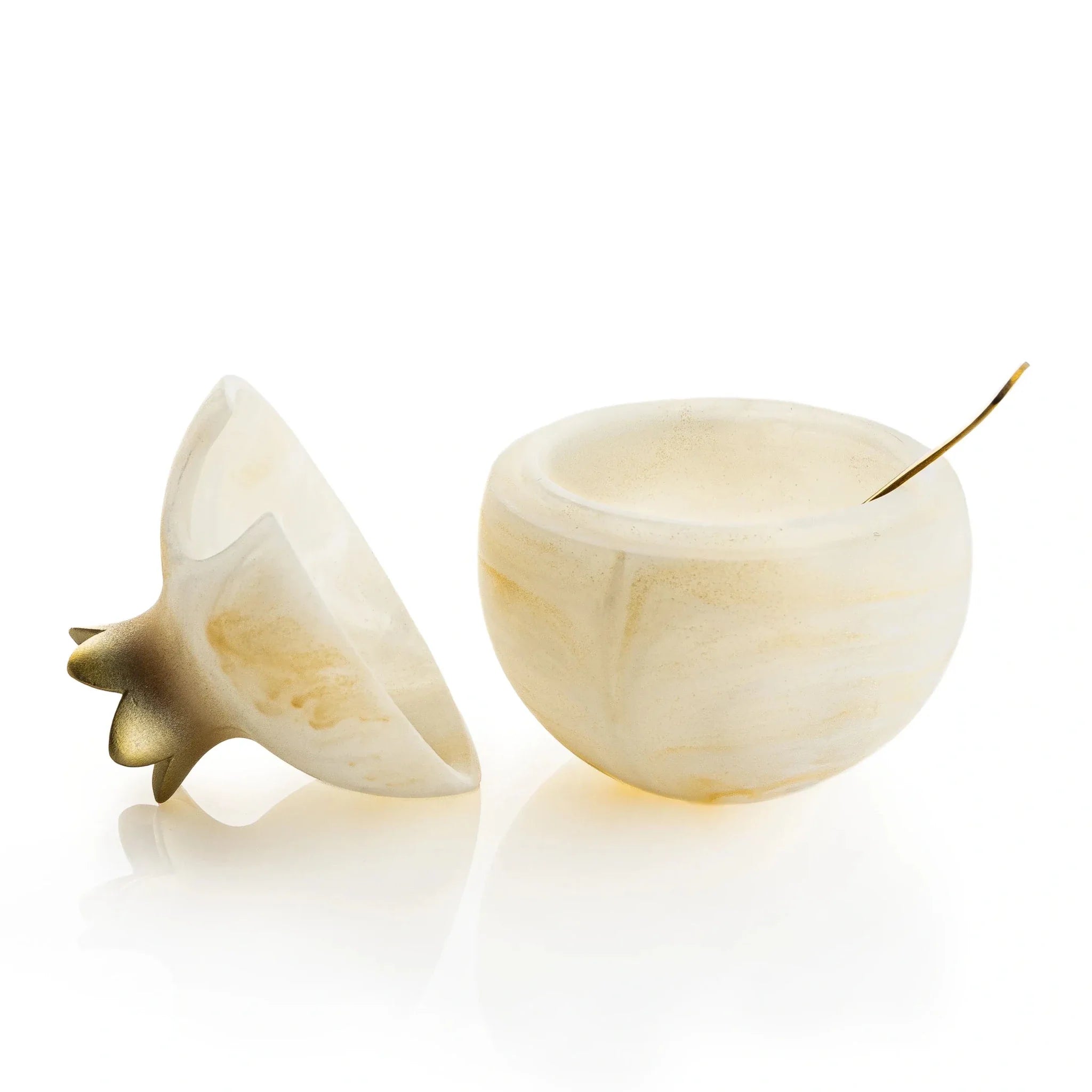 Gold resin pomegranate honey dish with its lid lifted, showing the honey well