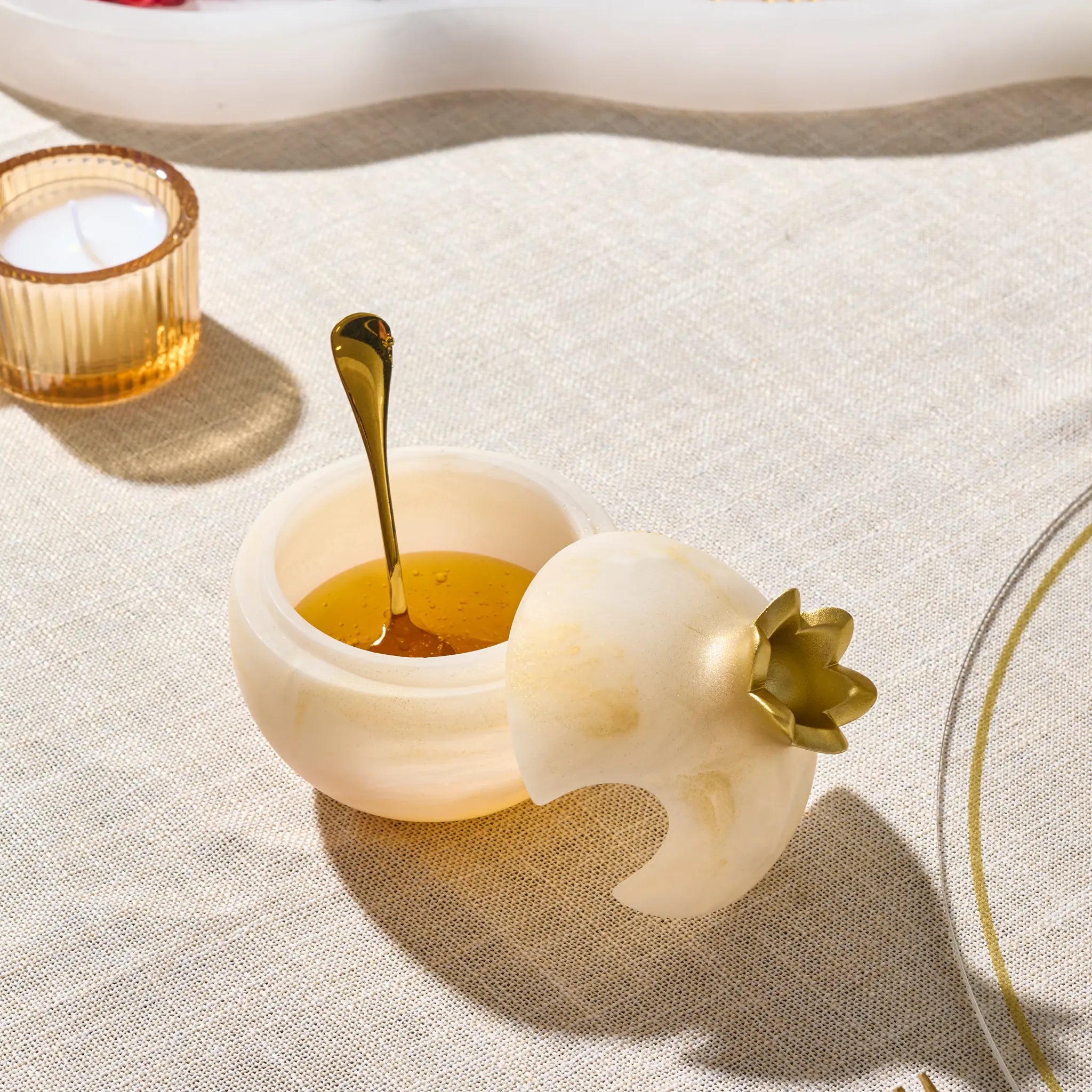 Gold resin pomegranate honey dish from the Rosh Hashanah gift set