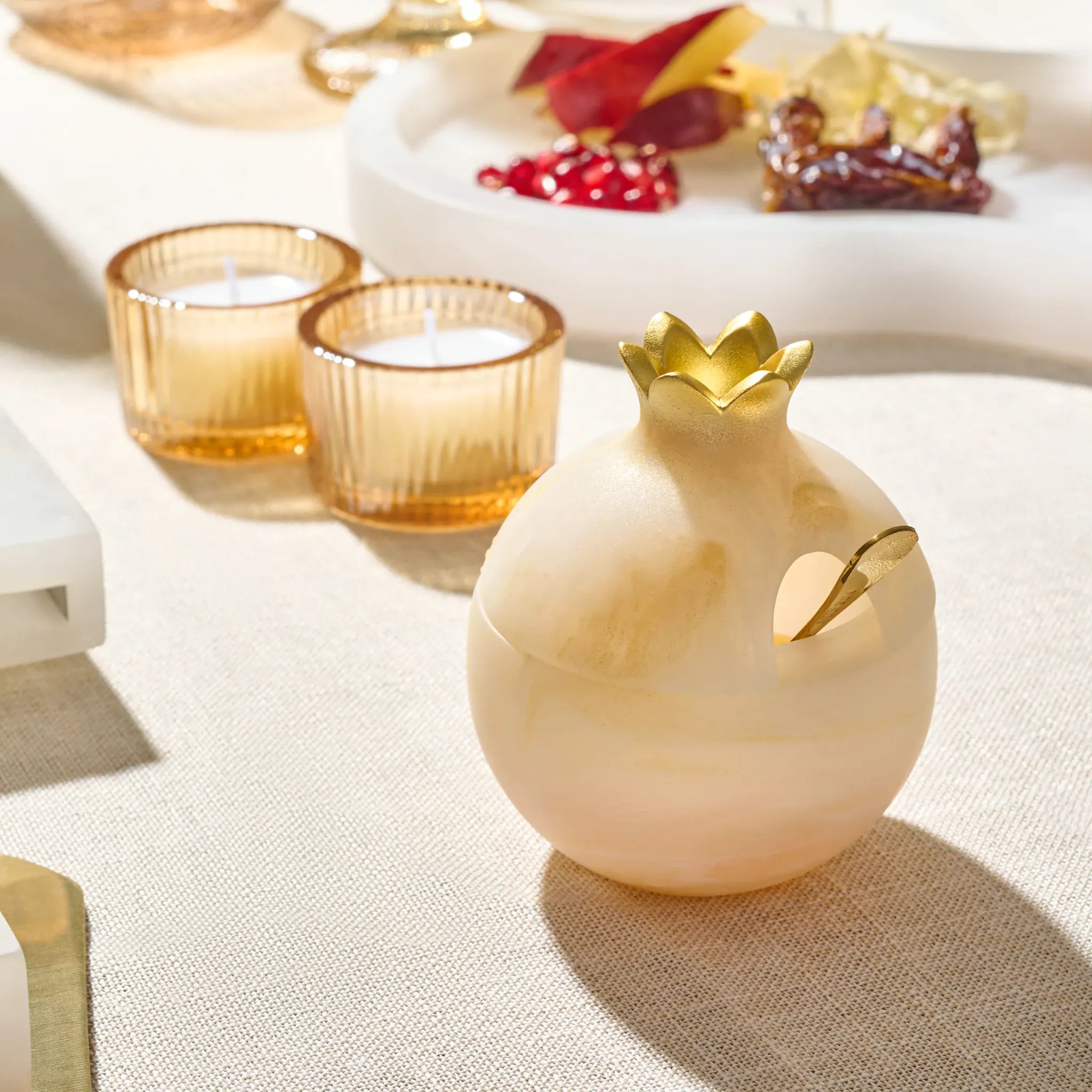 Gold resin pomegranate honey dish for Rosh Hashanah