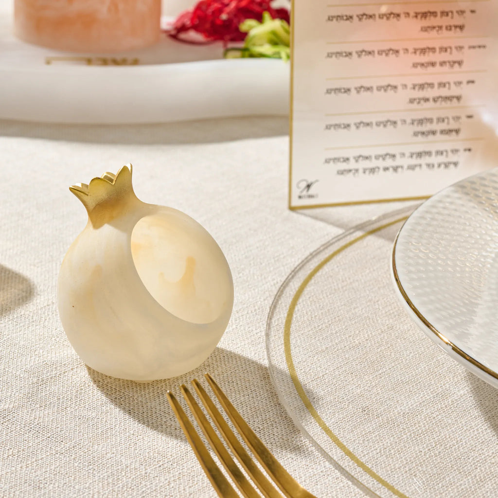 Gold personal pomegranate honey dishes in resin, one per guest for Yom Tov