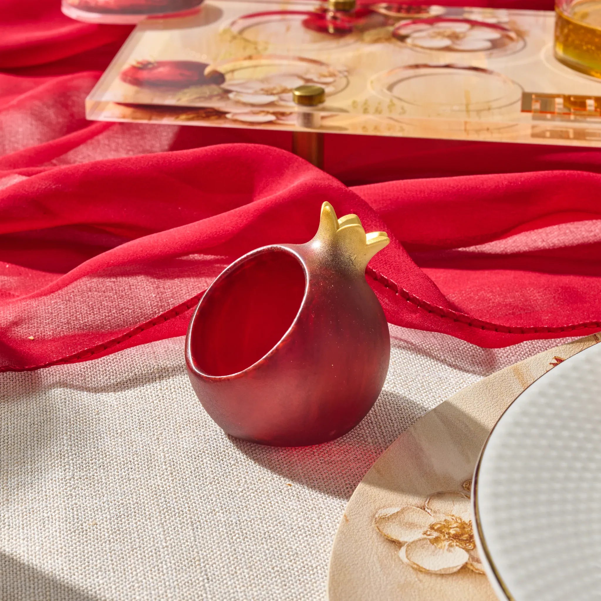 Personal resin honey dishes set one beside each seat for Rosh Hashana