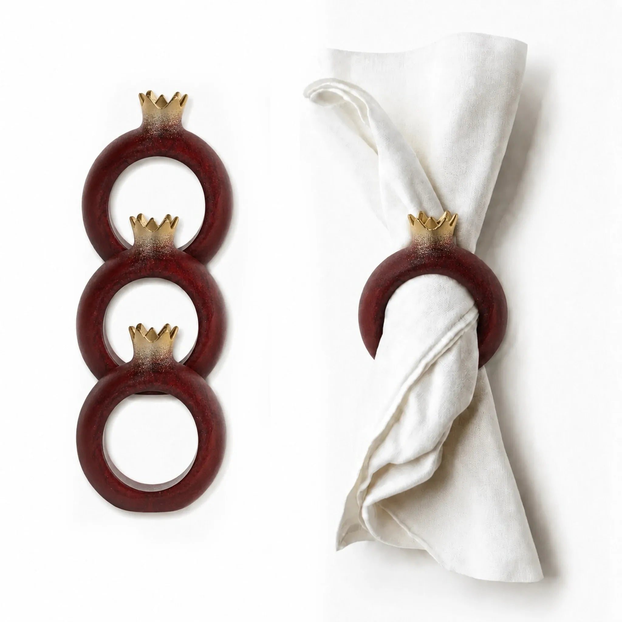 Resin pomegranate napkin rings framing folded napkins for Rosh Hashana