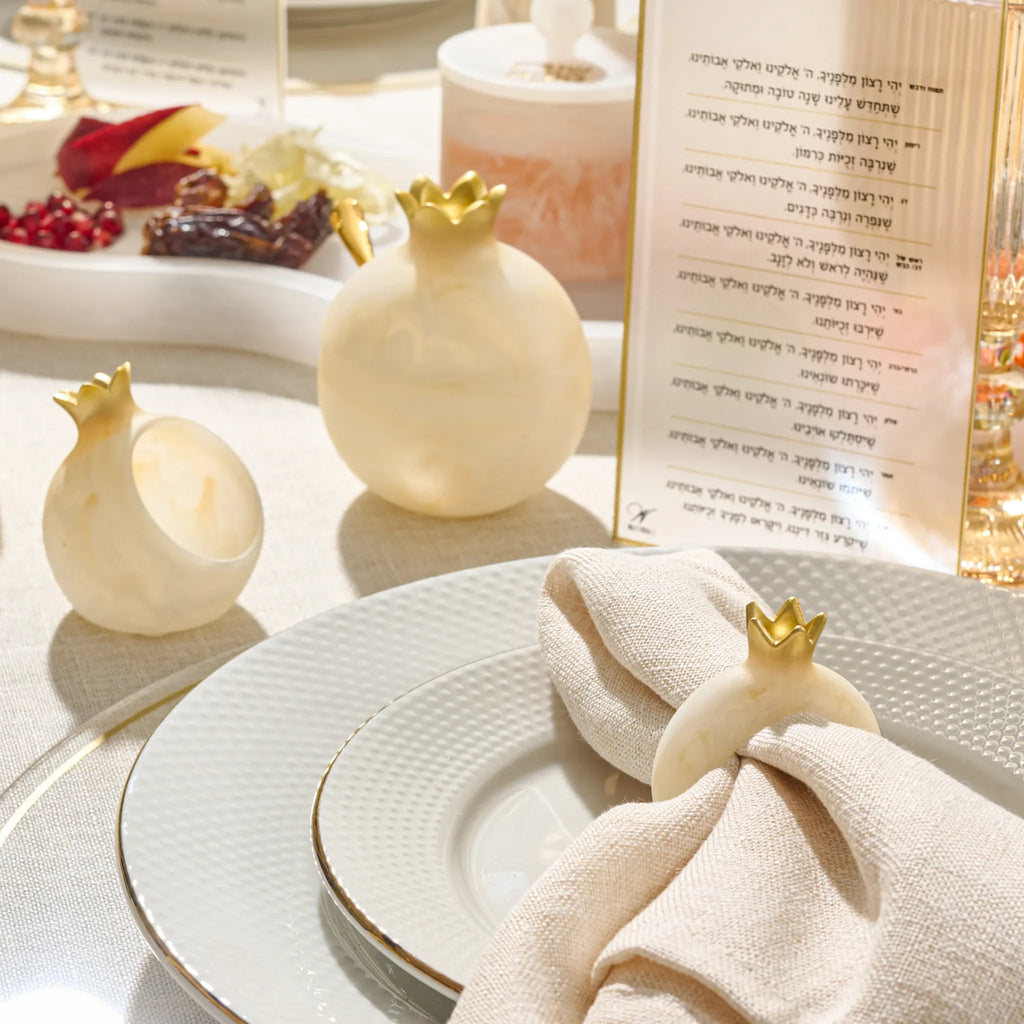 Gold pomegranate napkin rings in premium resin for Shana Tova table decor