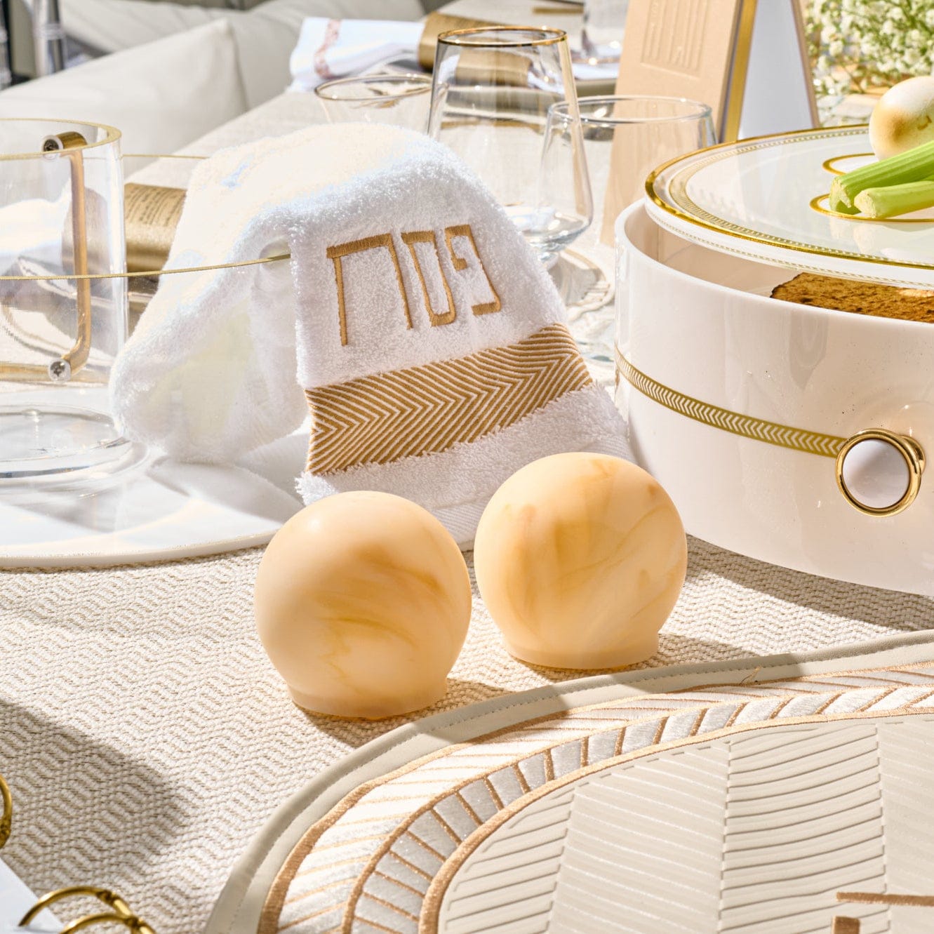 Resin Salt Shakers in marble cream finish, modern Judaica salt and pepper set for Shabbat table, elegant Jewish home decor for challah and holiday meals.