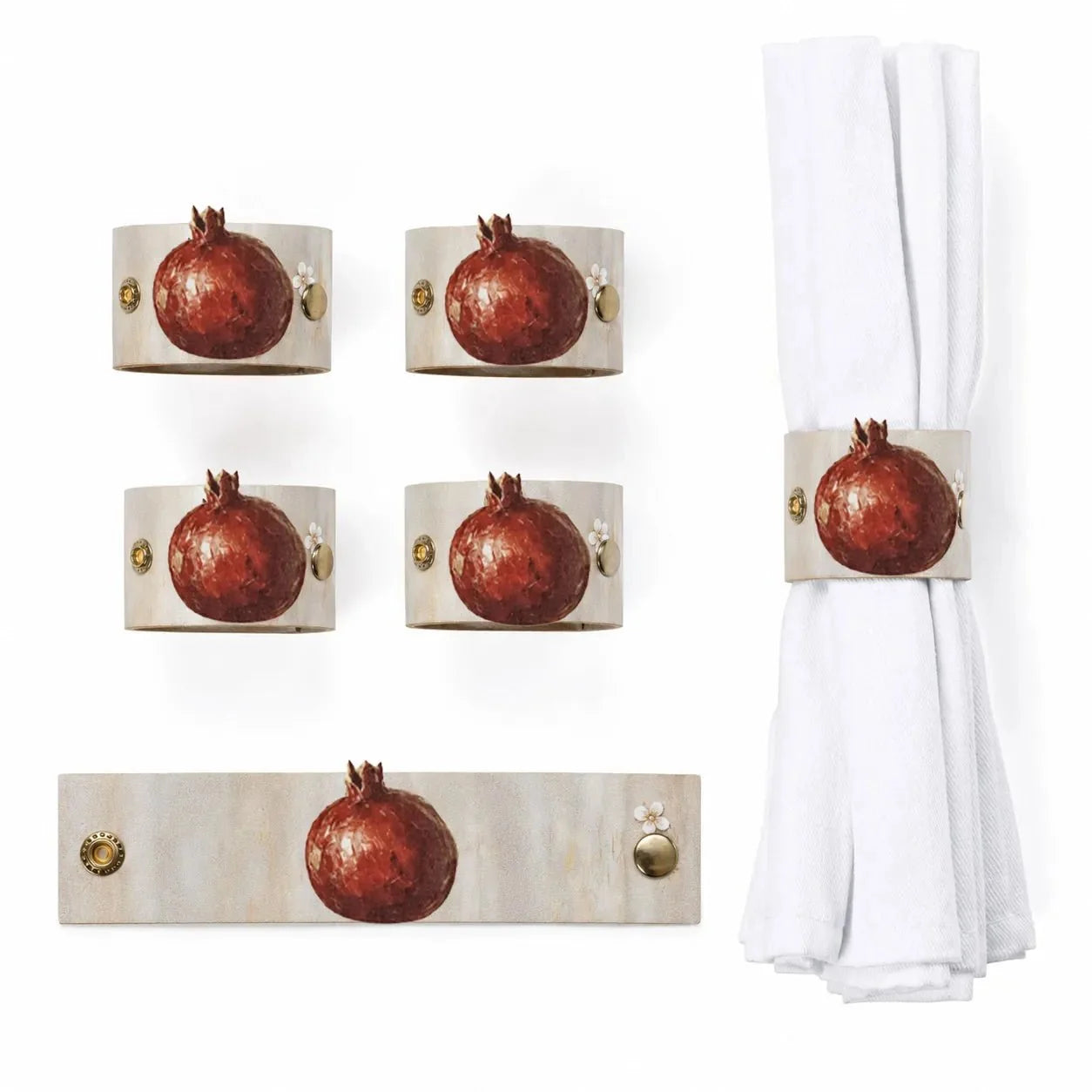 Painted pomegranate napkin wraps on a Rosh Hashonah place setting (ראש השנה)