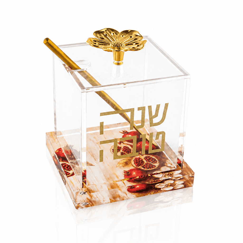Painted honey dish styled on a Rosh Hashonah table setting