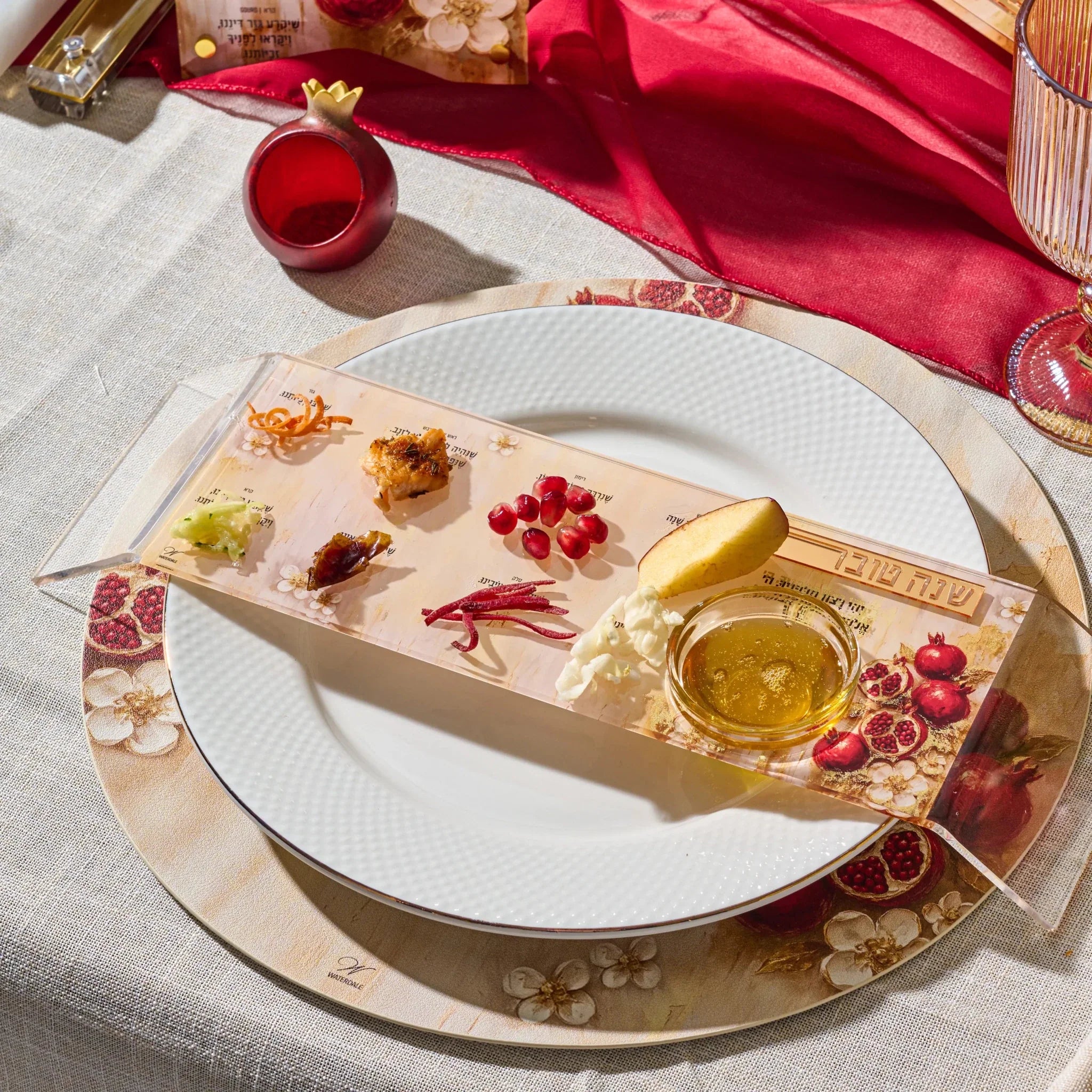 Raised Lucite Simanim tray with a labeled space for each siman for Rosh Hashana