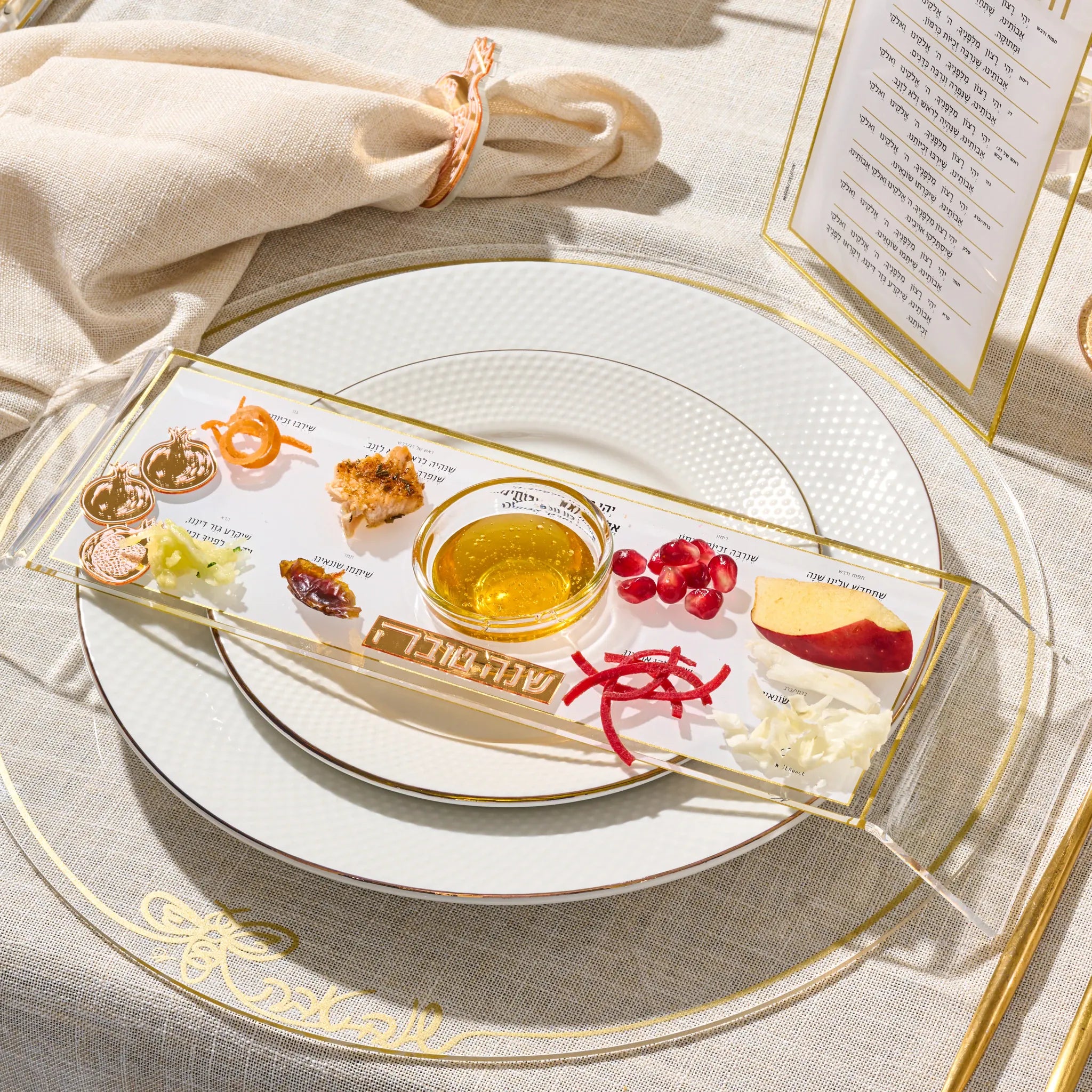 Gold raised Simanim tray with the Yehi Ratzon text beside each siman