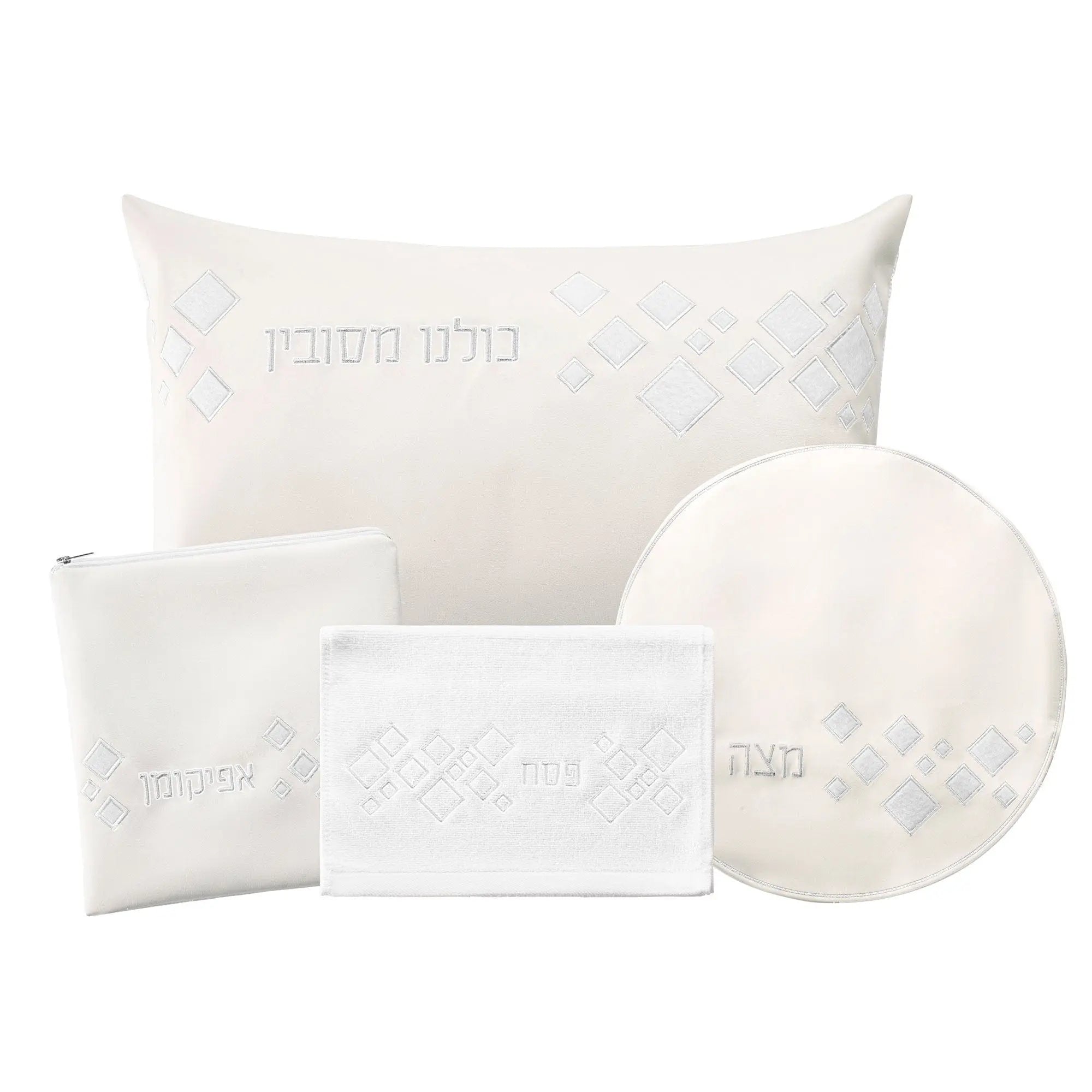 Scattered Fur Pesach Set in white and gold leather by Waterdale Collection, featuring matching placemats, napkins, and circular plate holder for holiday tabletop.