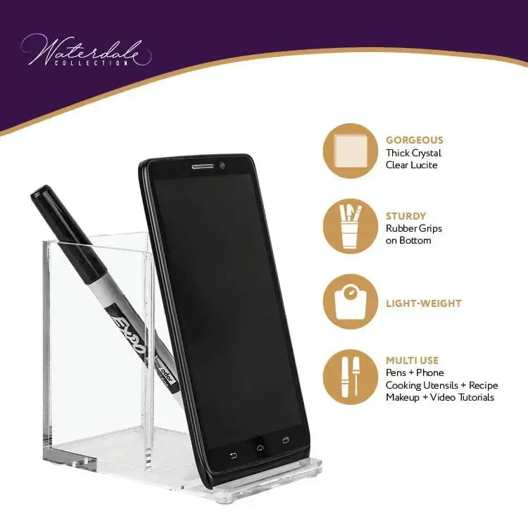 Clear acrylic pen and phone holder by Waterdale Collection with black smartphone and pen displayed, featuring practical desktop organization.