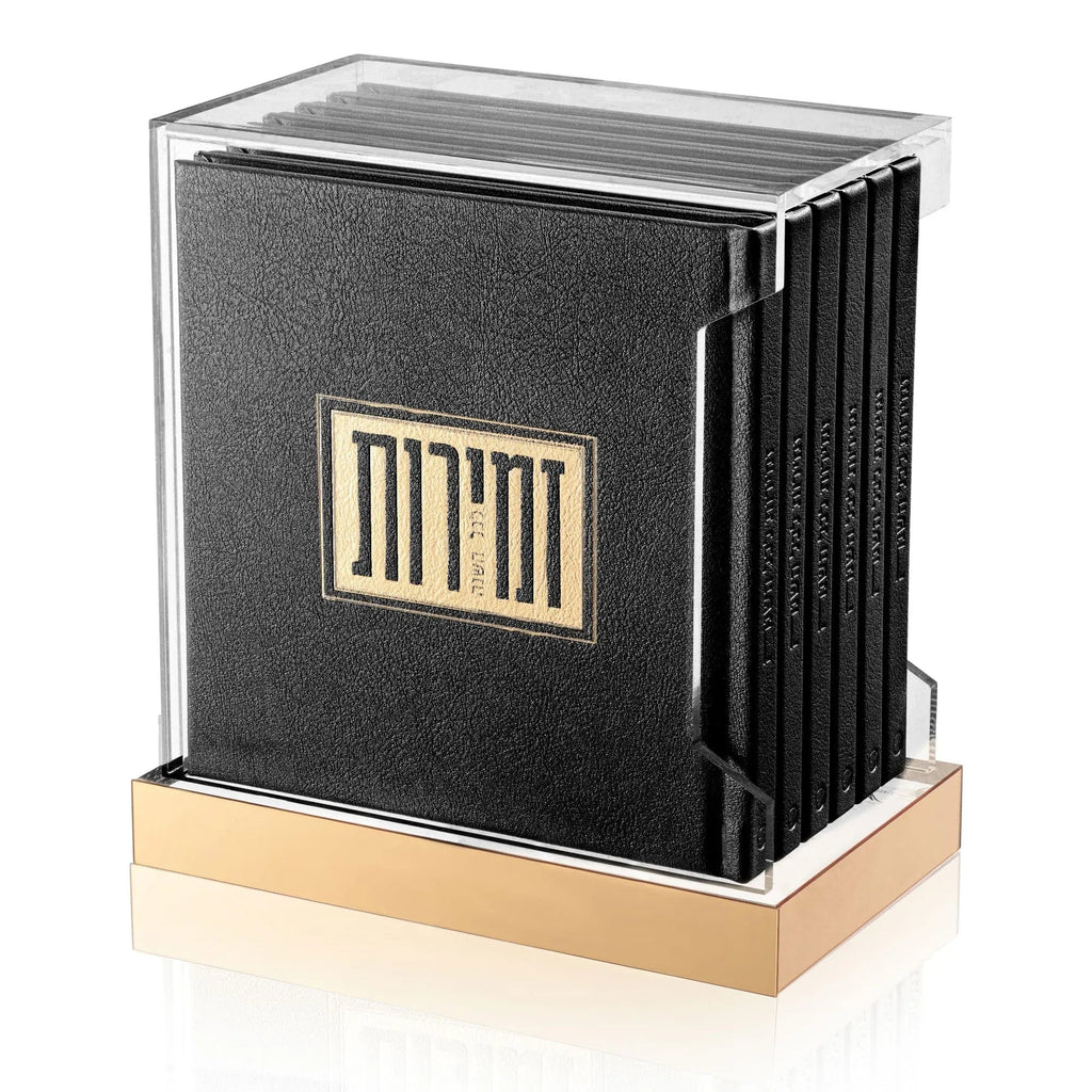 Square Shabbos Zemiros Bencher Set with black cover, gold accents, and wooden base in elegant tabletop display.