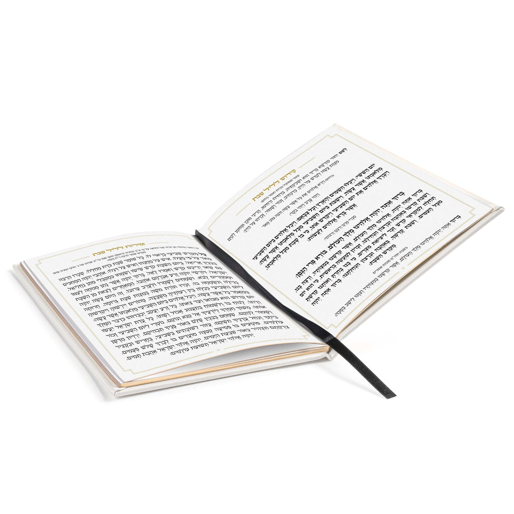 Square Shabbos Zemiros Bencher Set in cream and gold with black pen, open to show Hebrew text pages for Shabbat blessings.