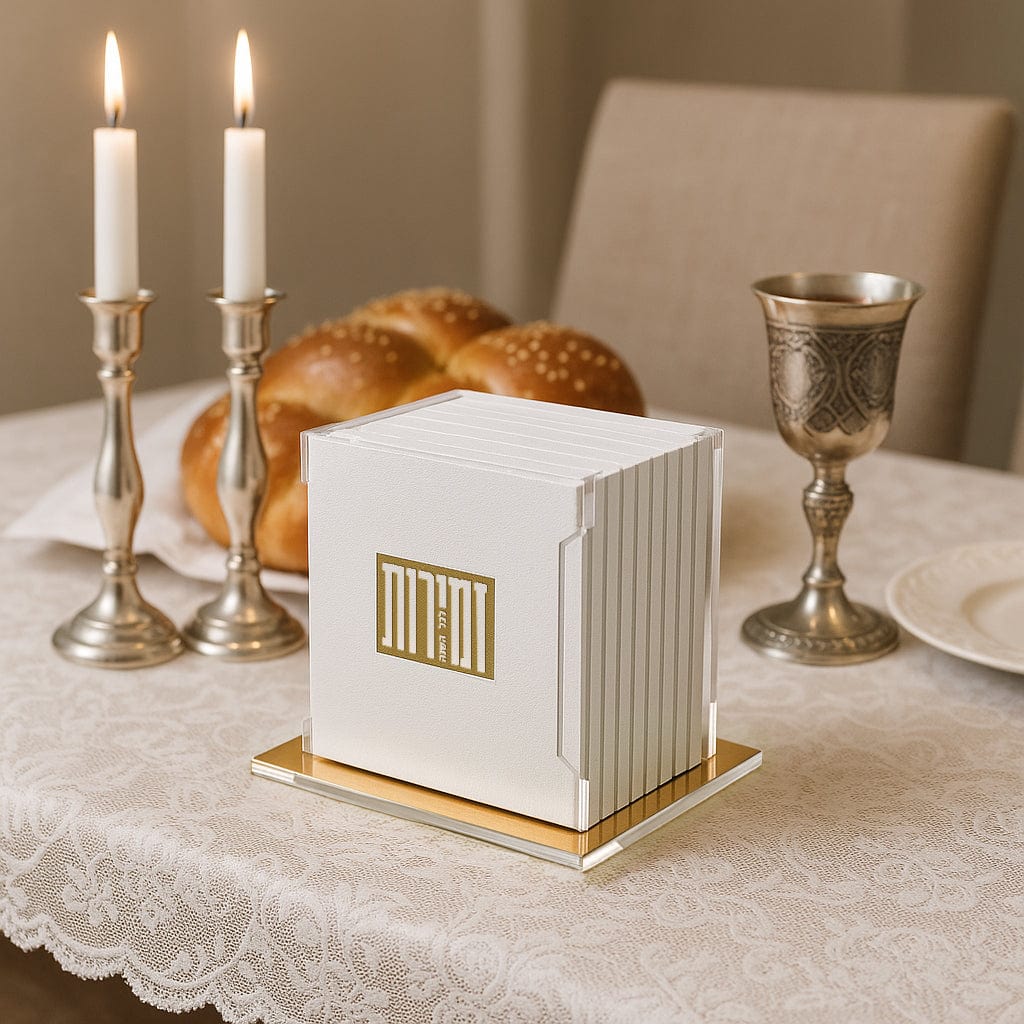 Square Softcover Leather & Lucite Zemiros Bencher Set on a table.