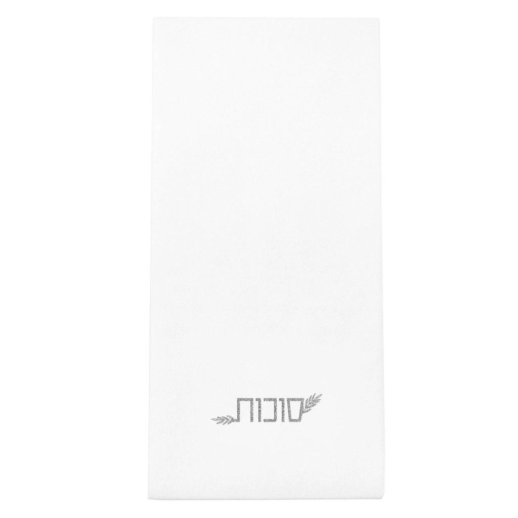 White Sukkos guest towelettes with subtle logo design, perfect for holiday table settings and everyday use.