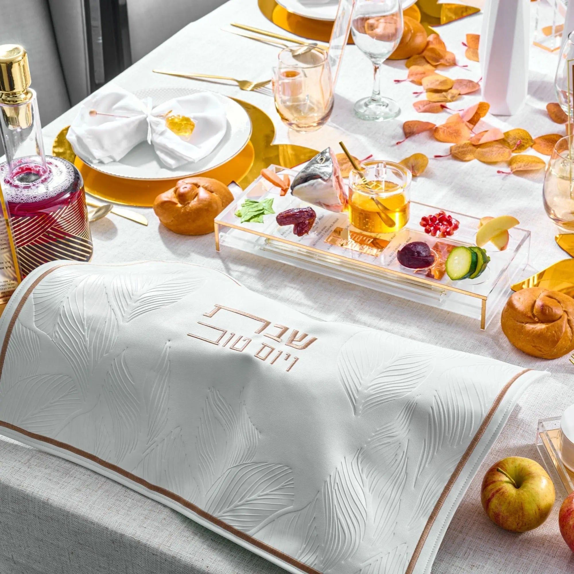 Waterdale Suspended Simanim Tray Card Set displayed on white bedding with arranged symbolic foods and gold accents for Rosh Hashanah.