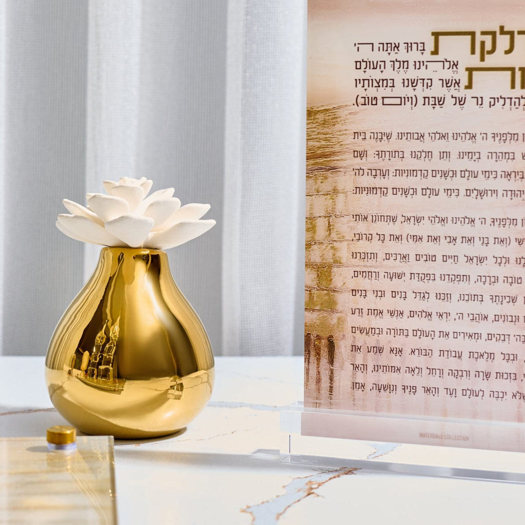 Sophisticated Teardrop Flower Diffuser by Waterdale Collection, luxury hostess or housewarming gift featuring a modern organic shape and long-lasting floral scent delivery.
